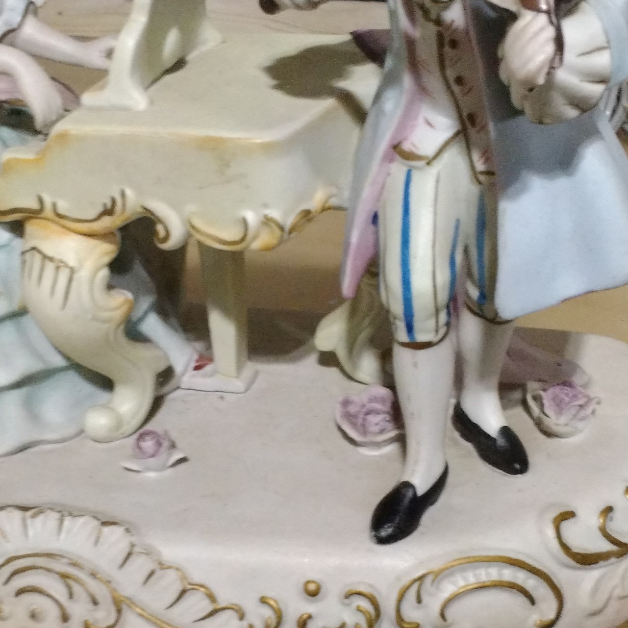 Hand painted bisque figurine couple playing music