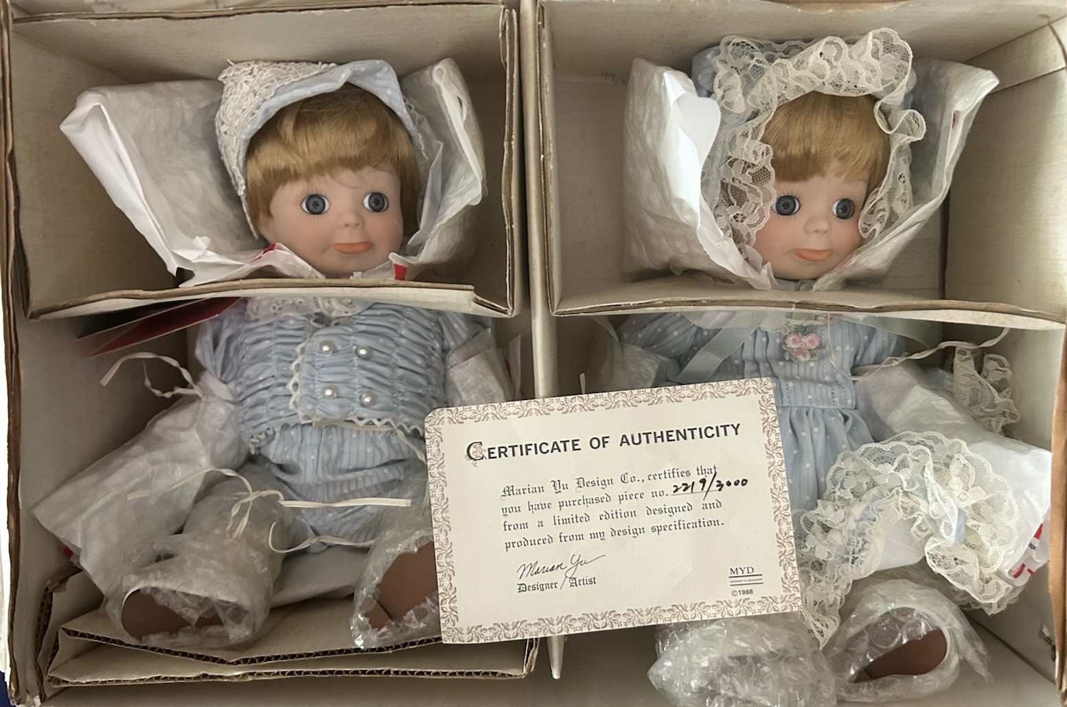 MYD little boy and girl limited edition #2219/3000 porcelain pieces. Twins.