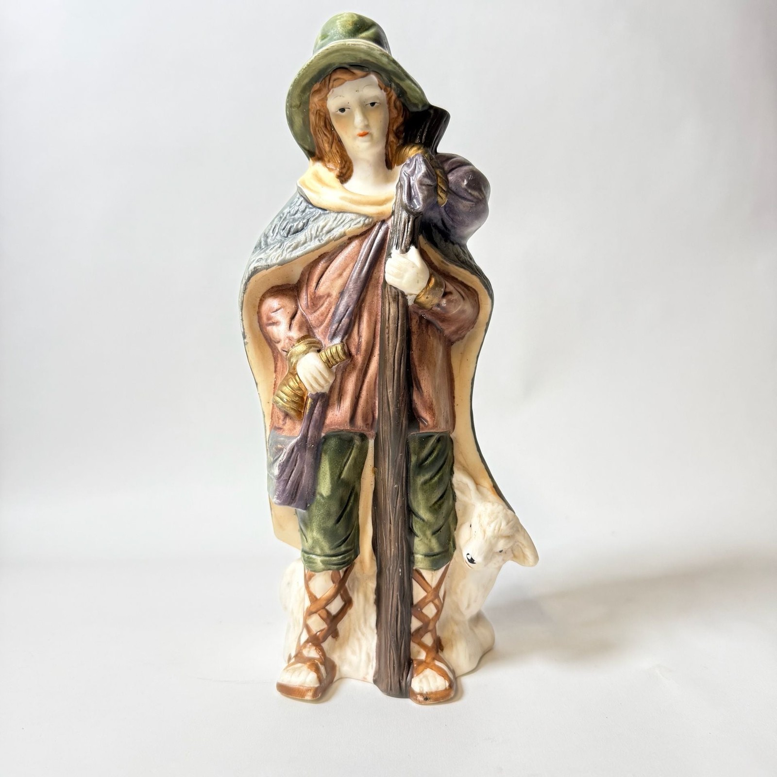 Vintage Porcelain Figurine of a Traveler with Staff and Bundle
