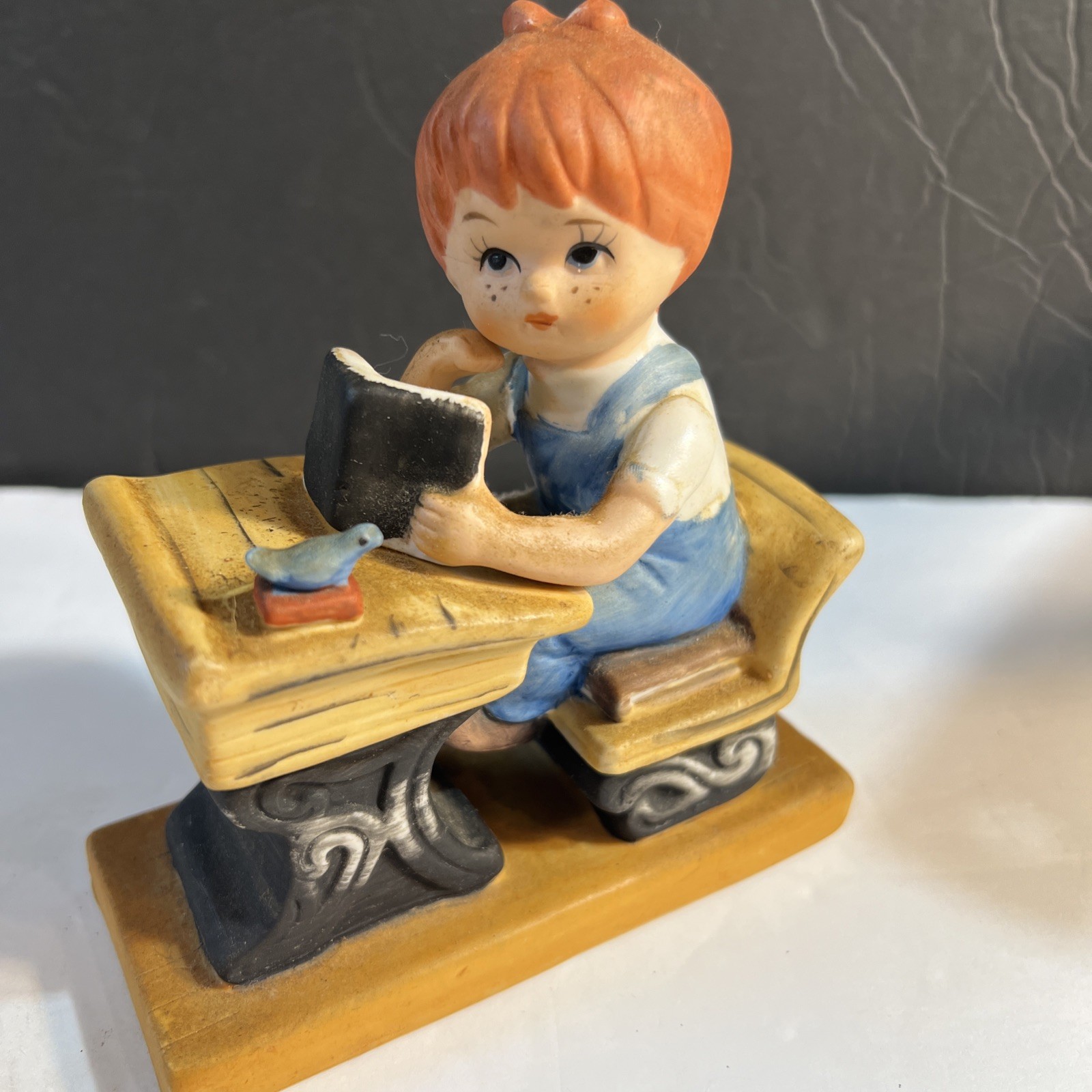 Treasures master vintage porcelain Red Hair kid at desk w/ bird and a book