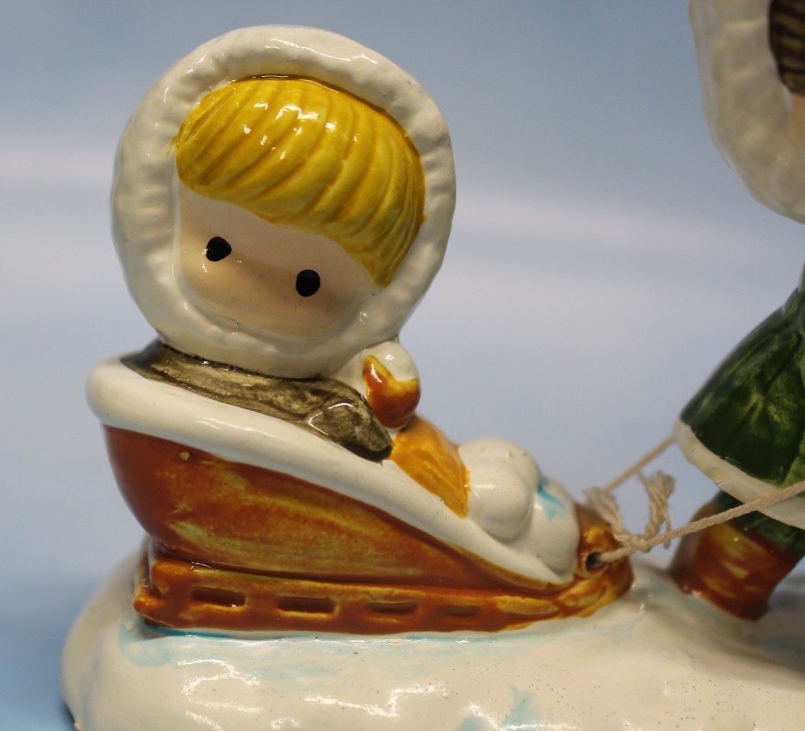 Joan Walsh Anglund. Vtg 1972 Ceramic Figurine children sledding made in Japan.