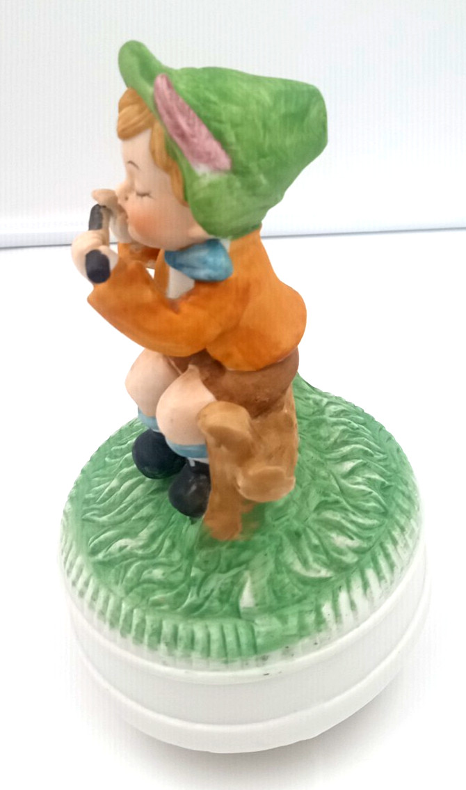 Vintage Boy Sitting On Fence Playing Flute 7″ Porcelain Figurine Music Box