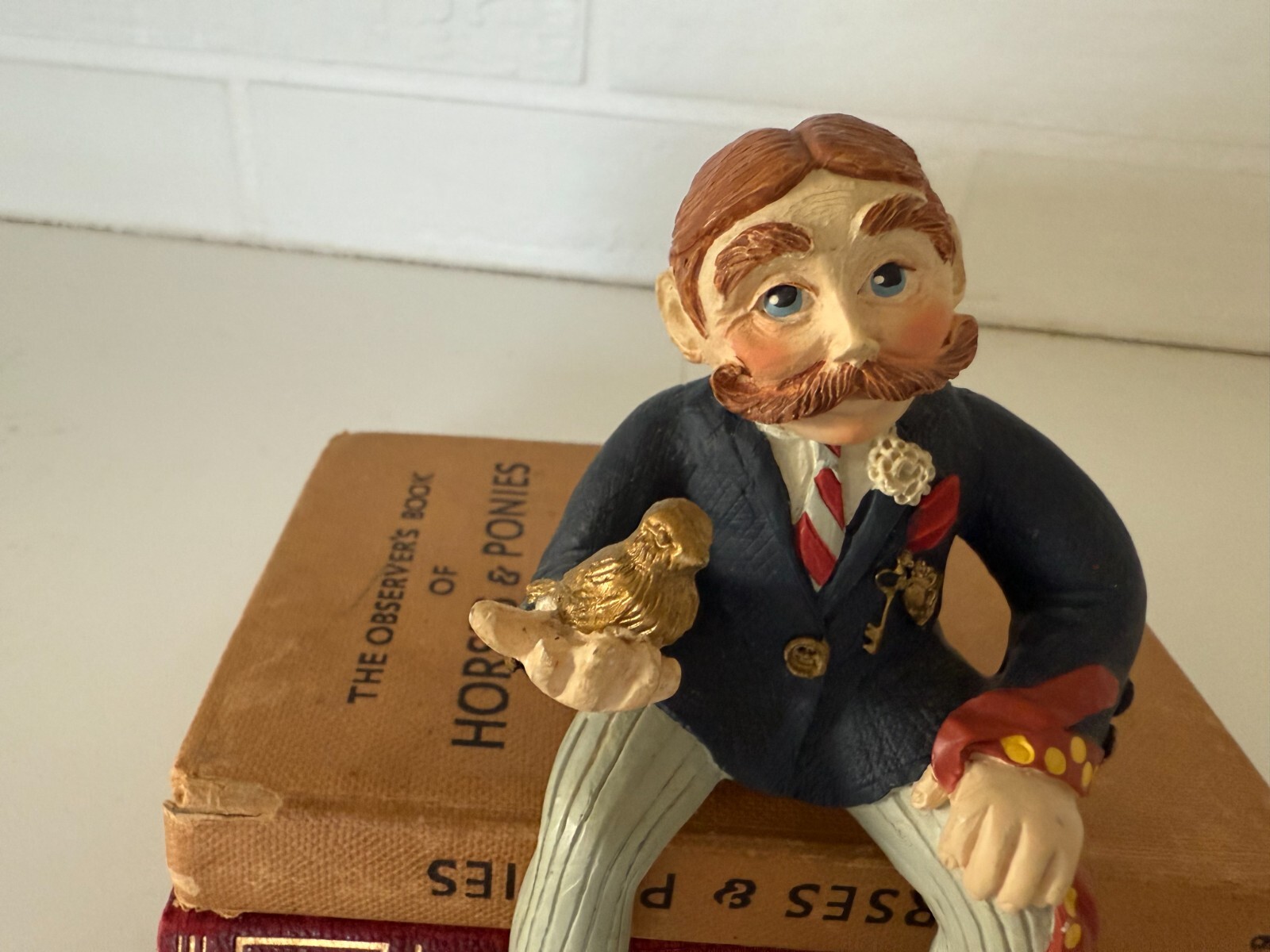 Shenandoah Designs Internatiional A Keeper Figurine Sitting Man w Bird in Hand