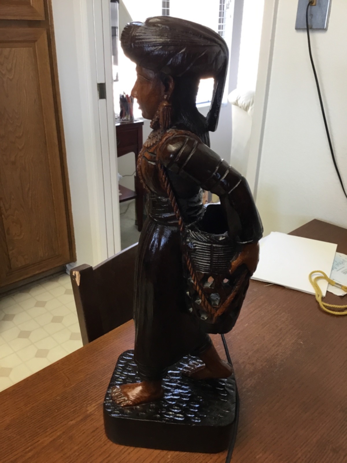 wood carved staute of woman from thailand. in great condition
