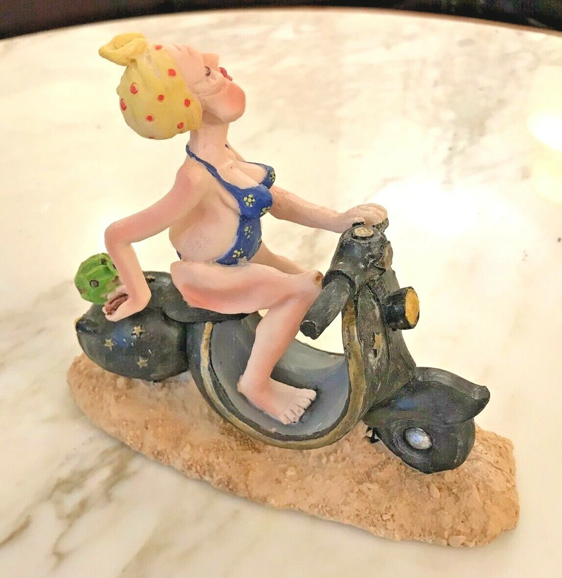 A Gift Corp Sexy Granny on a Black Moped