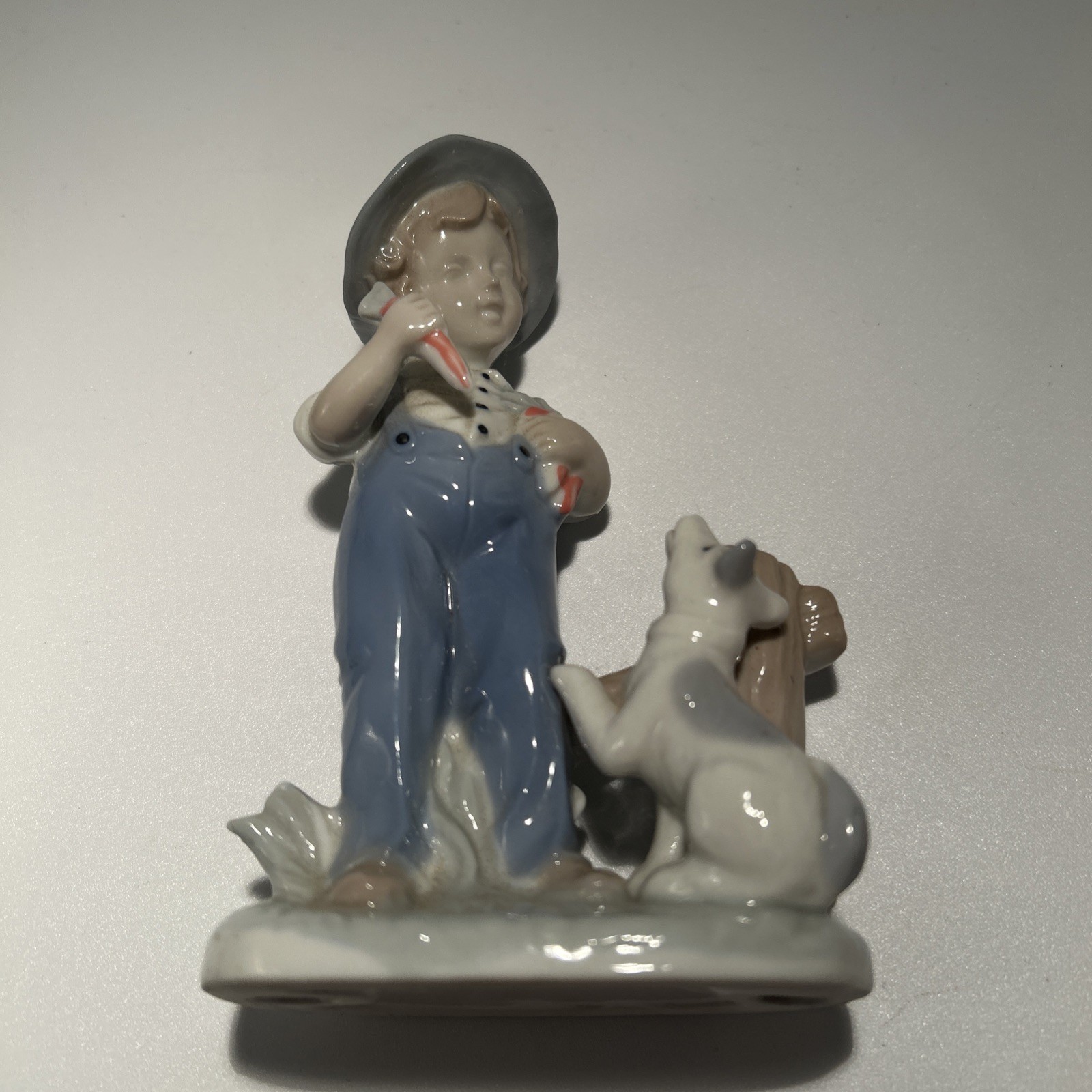 Porcelein Figurine, Boy and Dog, Blue & White VG 5-1/2 In Tall X 4 In Wide