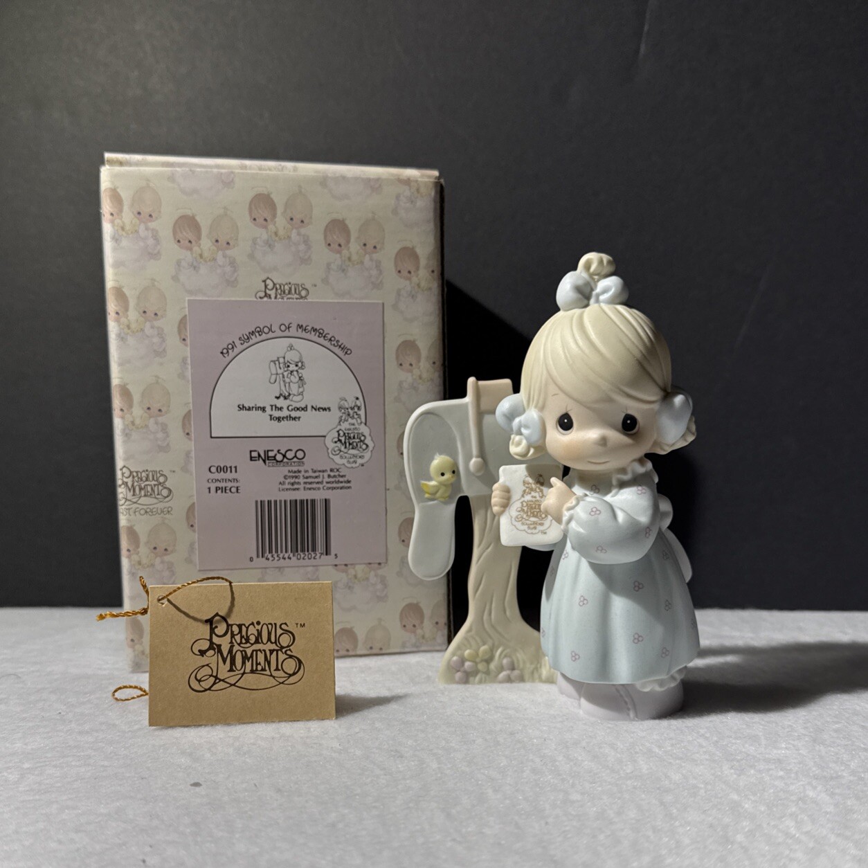 Precious Moments Figurine – Sharing The Good News Together -1991 Symbol Member..