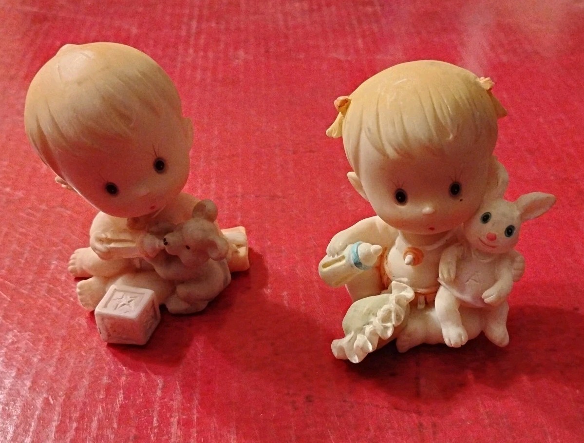 Set Of Two Turtle King Corp Figurines. A Boy Baby And Girl Baby