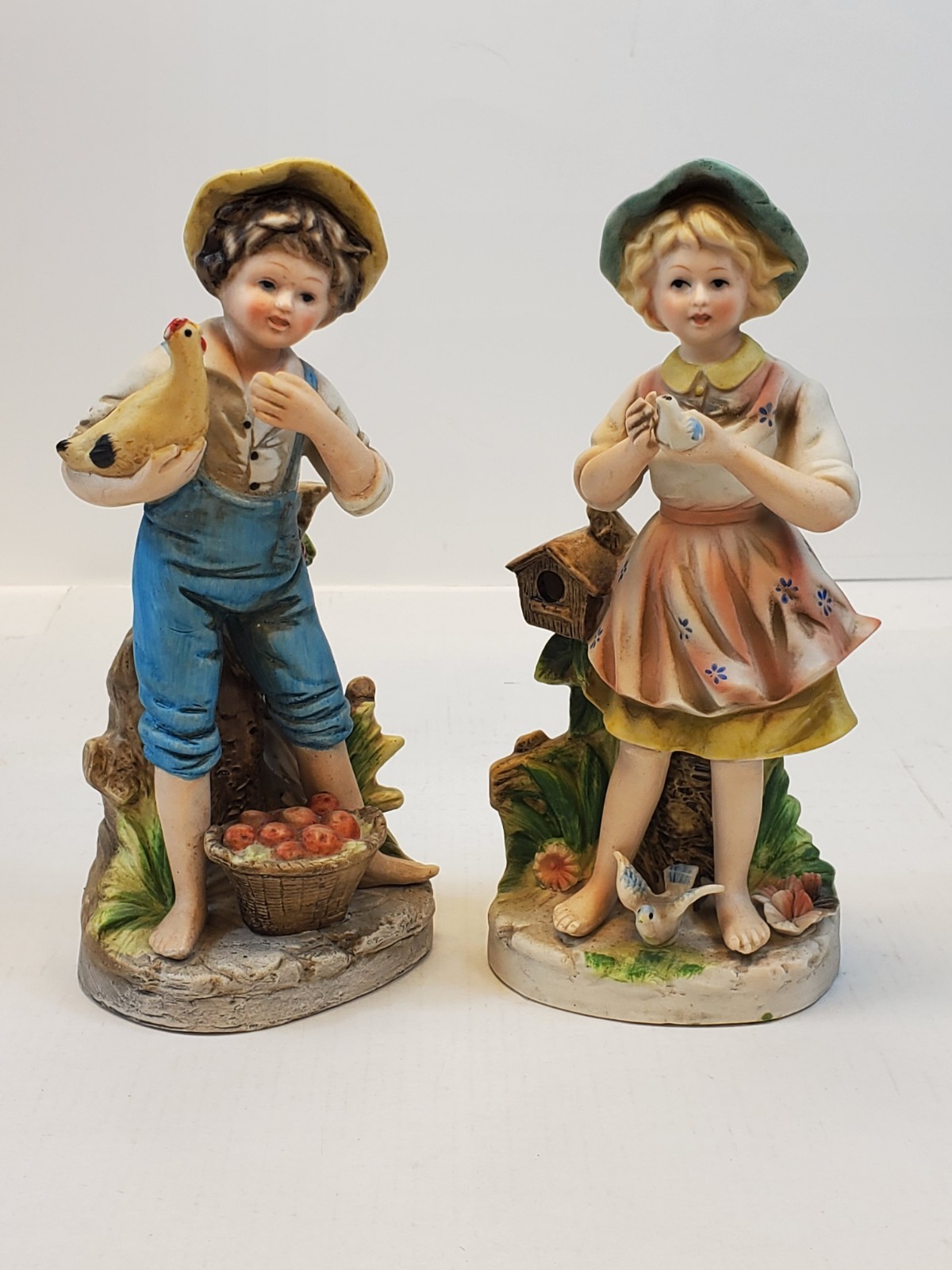Homco Porcelain Figurines Boy & Hen Girl & Bird Bisque Collectibles Set Of 2