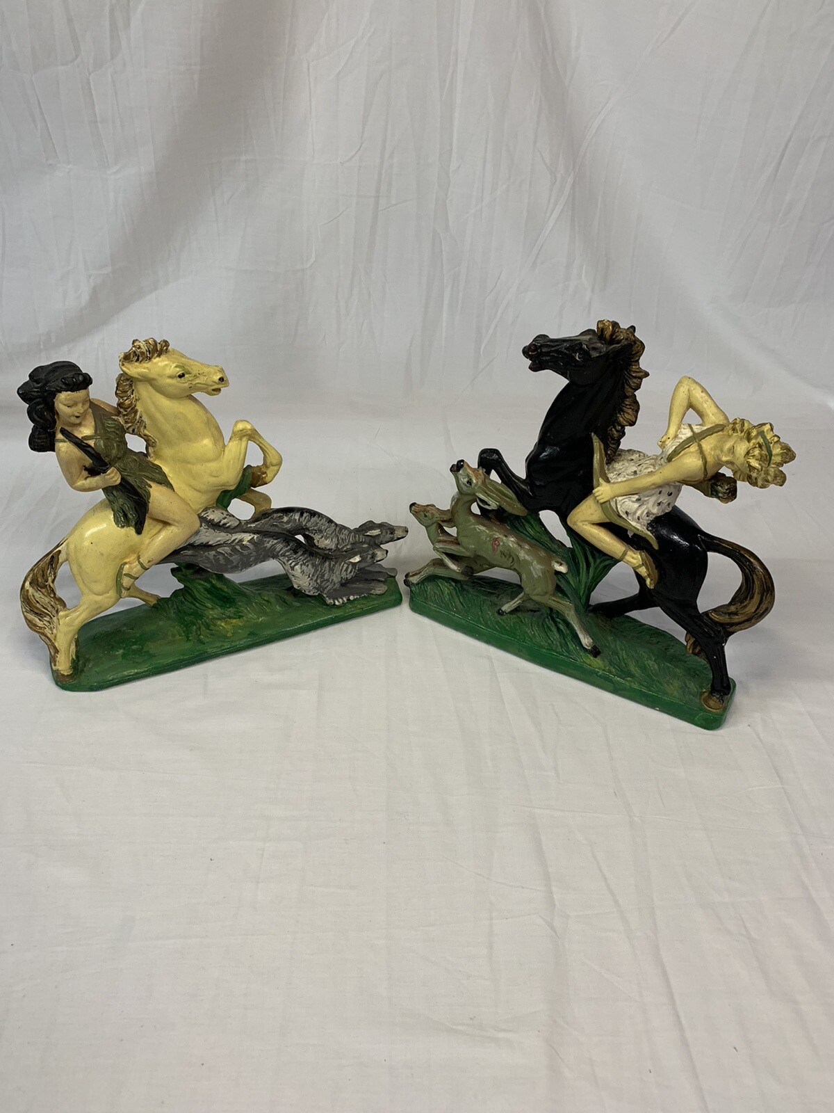 Pair Figures after Santini – Huntress Diana on Horse, 1 with borzo & 1 with deer