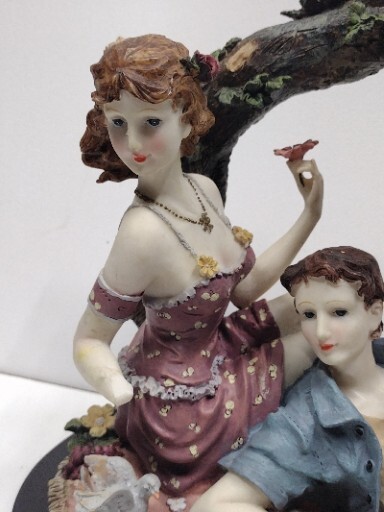 Giovanni Collection Sculpture. Lady And Man With Dog At Picnic Nesting Birds.
