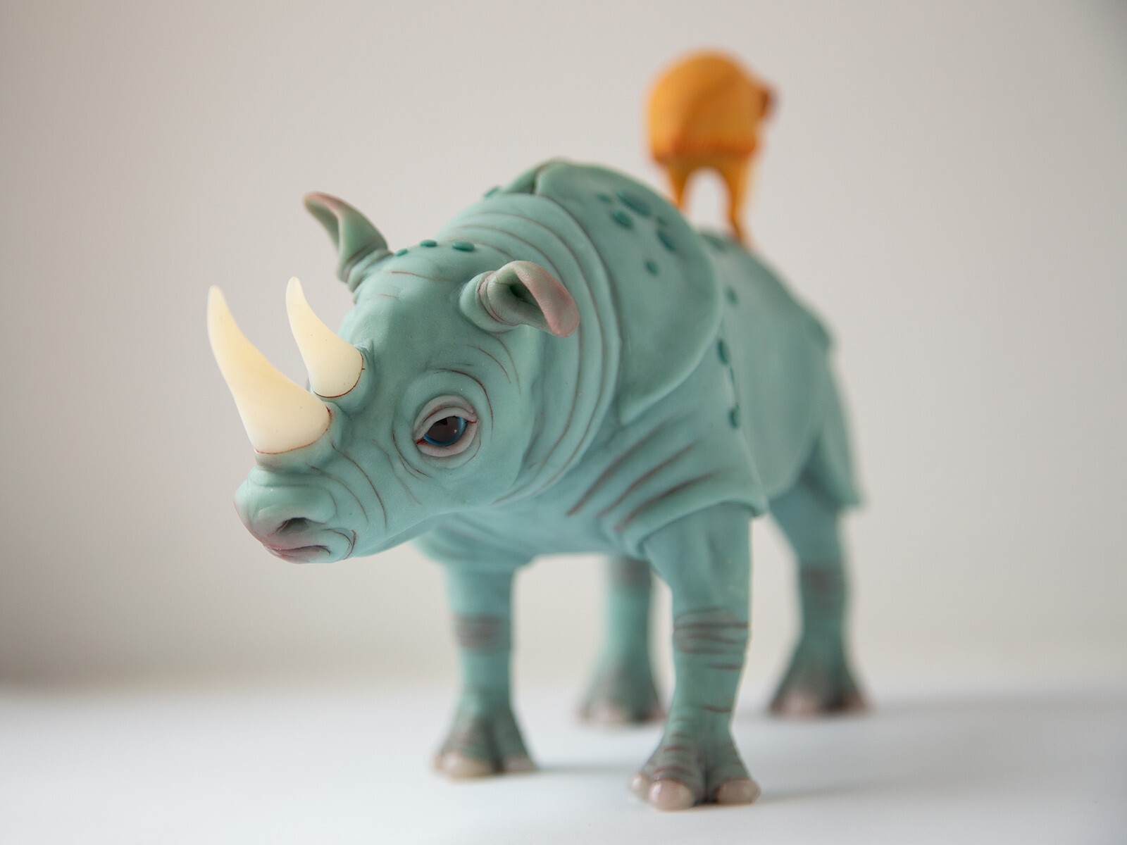 Perfect marriage – weird sculpture gift for couple, rhino and bird family statue
