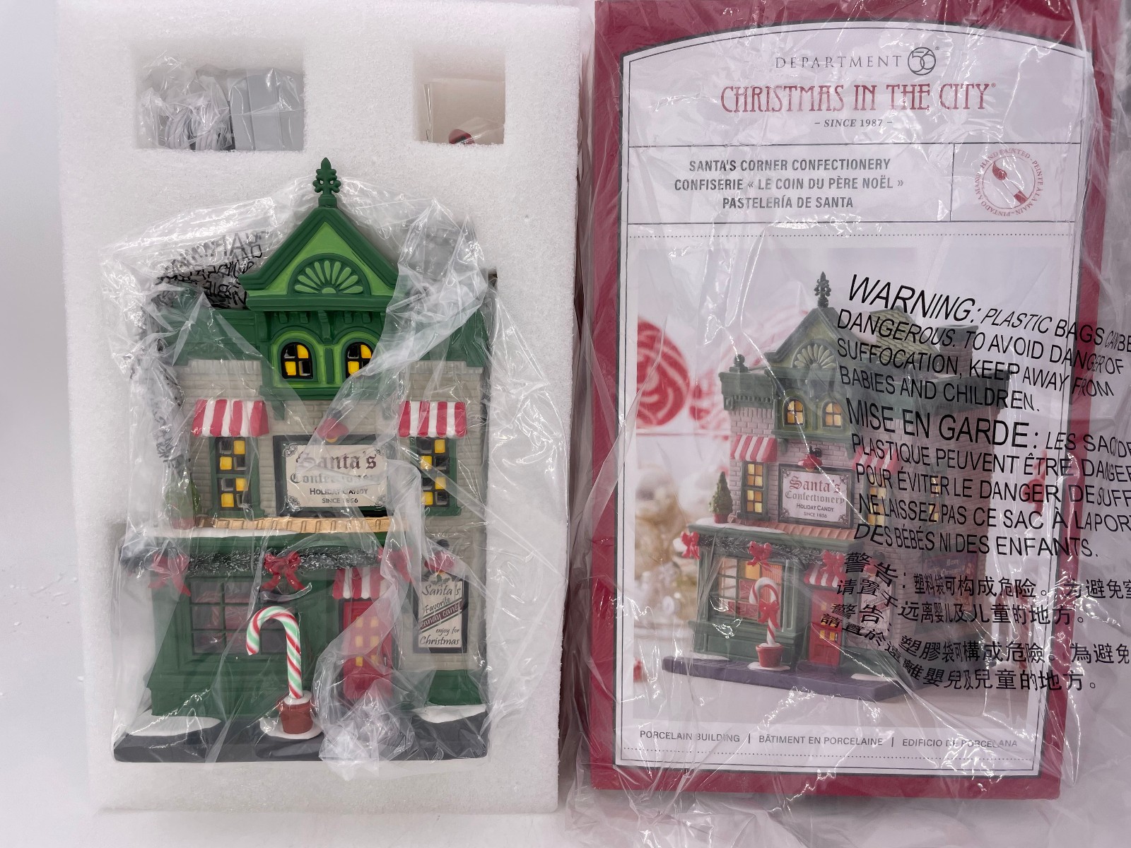 Department 56-Christmas in the City- Santa’s Corner Confectionery – 6013402