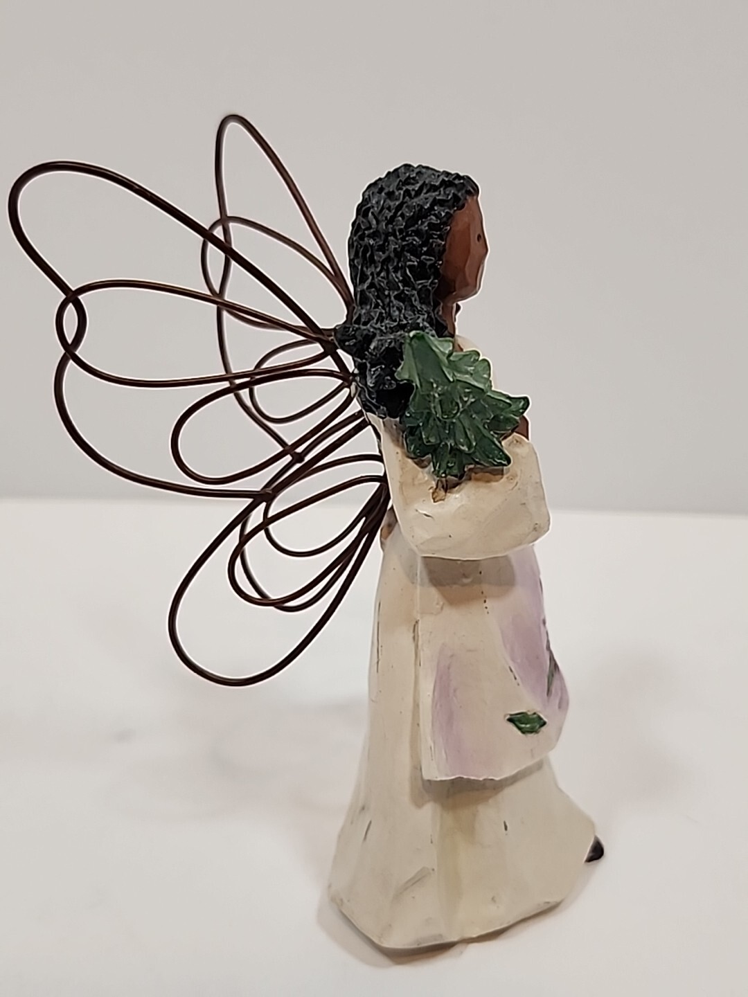 African American Angel Figurine With Metal Wings Holding A Christmas Tree