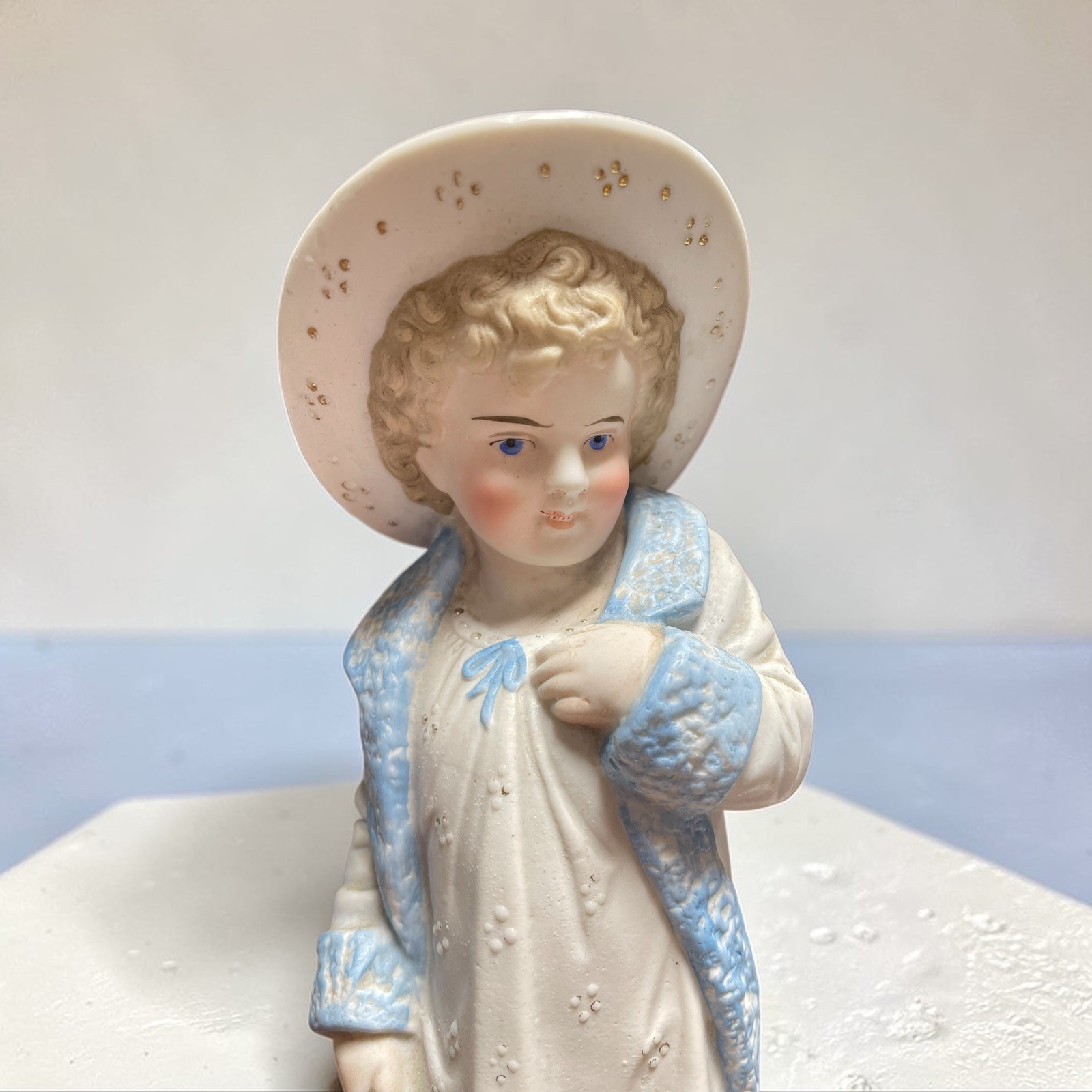 Antique German Bisque Figurine Boy in Oversized Boots Intaglio Eyes Heubach