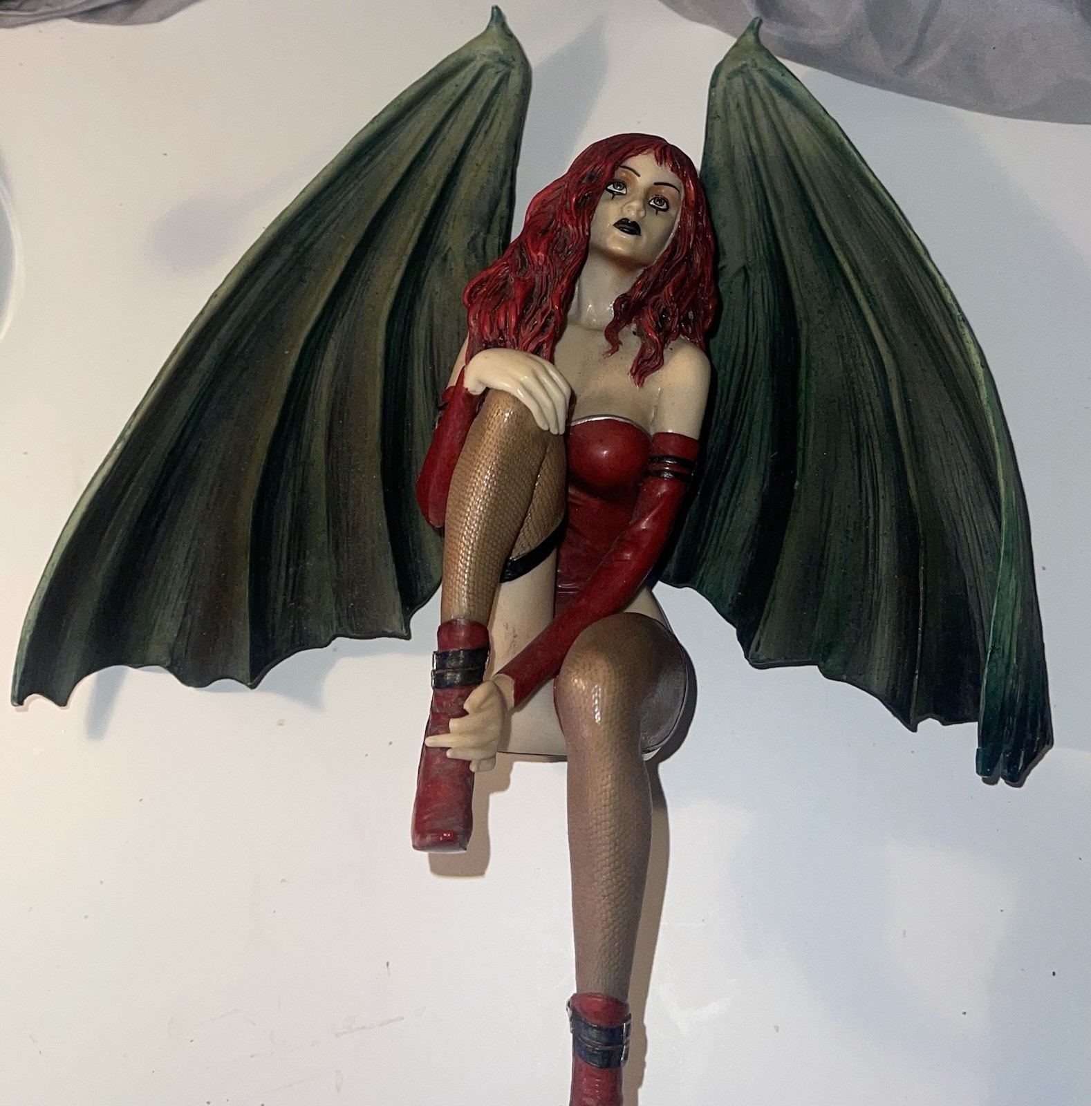 gothic fairy statue with a dark, edgy aesthetic, fantasy art collections.