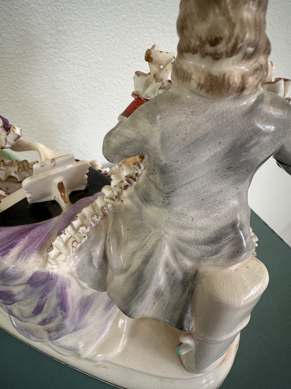 Vintage porcelain musical trio. 8” tall and 8.5 width