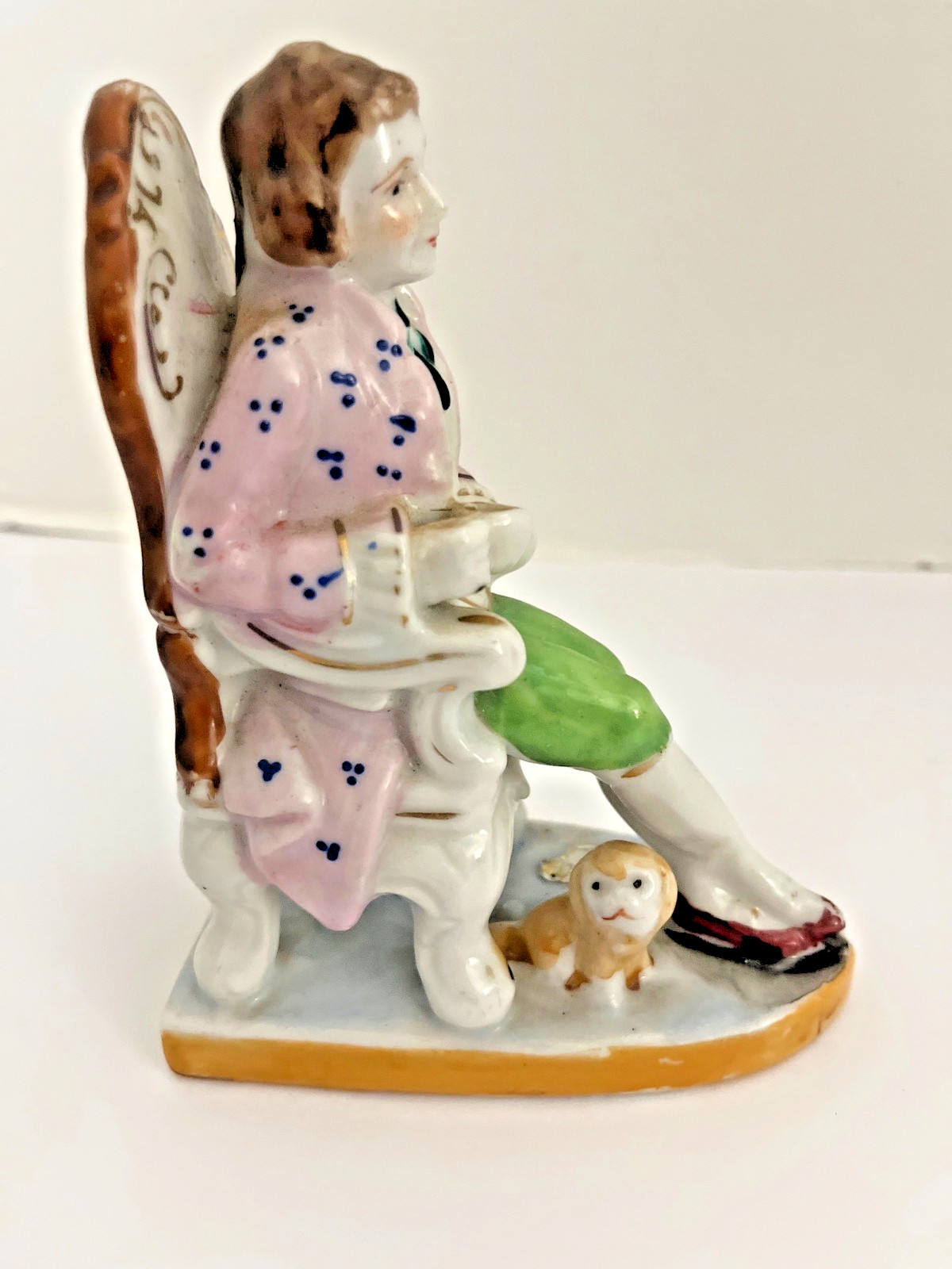 Vintage Porcelain Figurine Man in Chair with Dog Hand Painted 5 1/2”