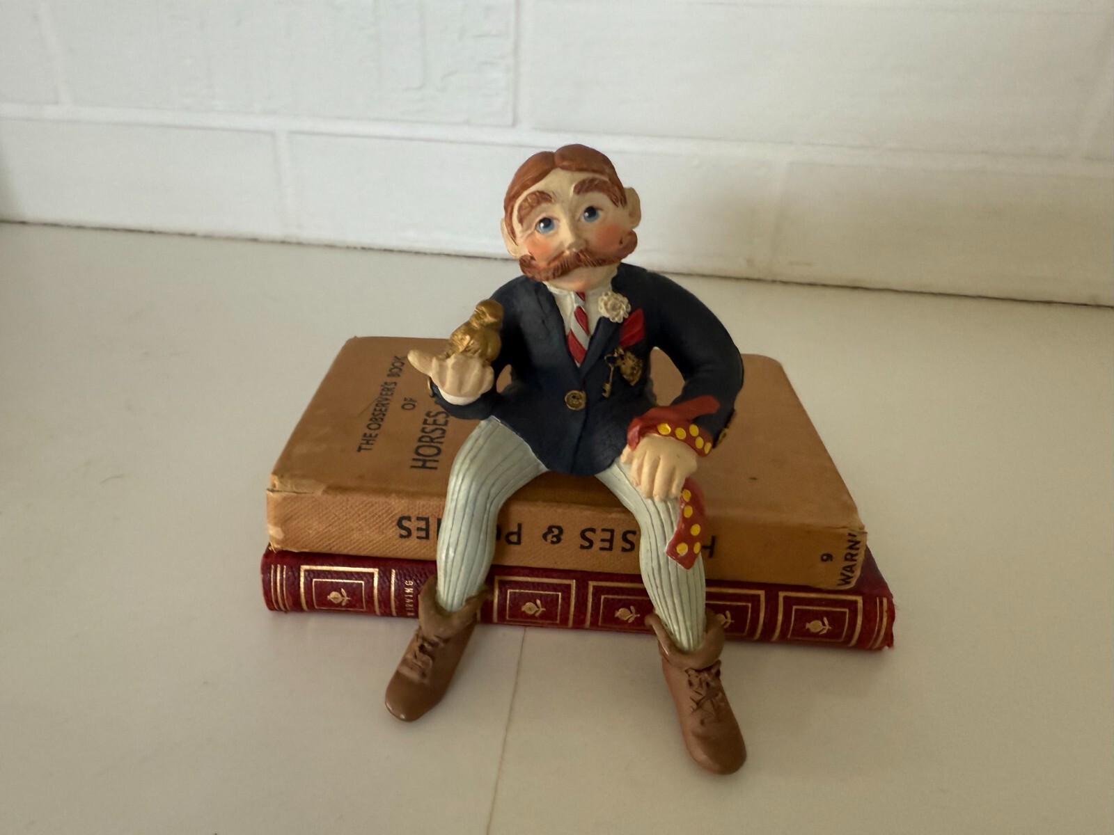 Shenandoah Designs Internatiional A Keeper Figurine Sitting Man w Bird in Hand