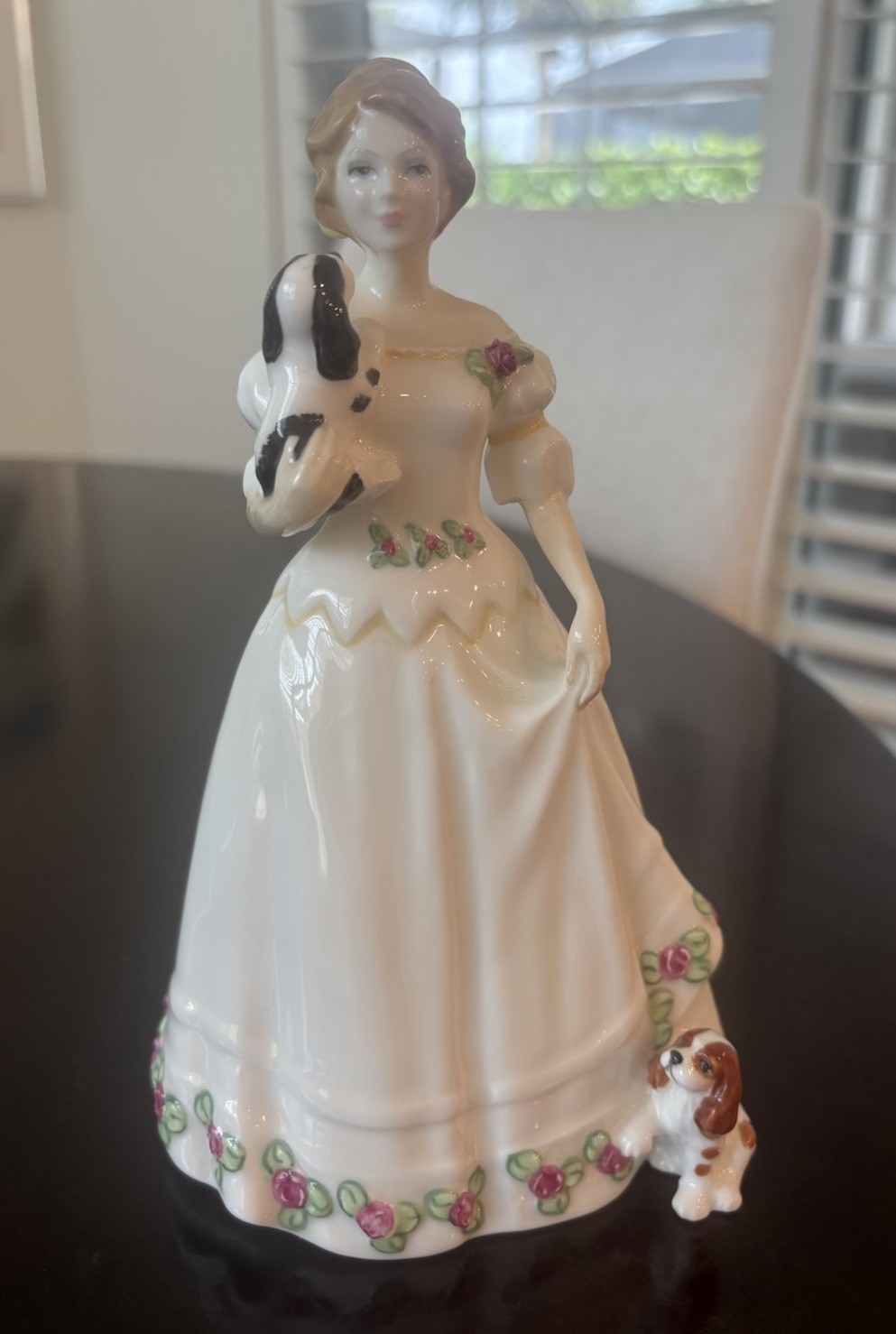Royal Doulton Take Me Home Figurine. Woman with English Cocker Spaniel Puppies