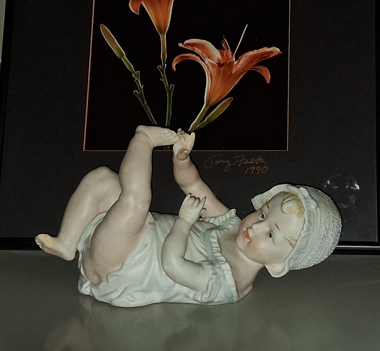 Gebruder Heubach-German Porcelain Bisque-Lying On Back Piano Baby–11″ Length