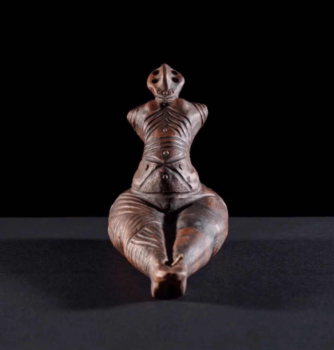 Ceramic Mother Goddess figurine, engobe ornament