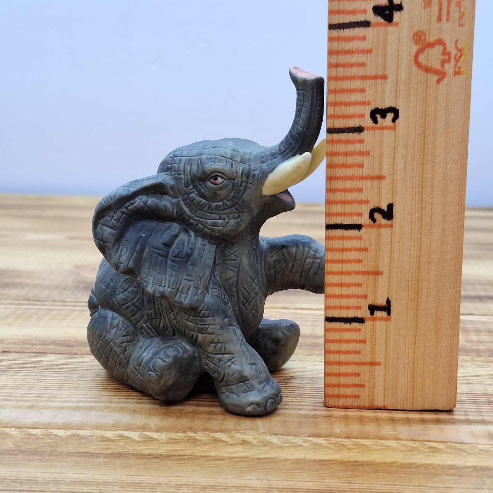 Baby Elephant Gray sitting Trunk up Tusk Pink tongue 3.5″ tall 3.25″ African