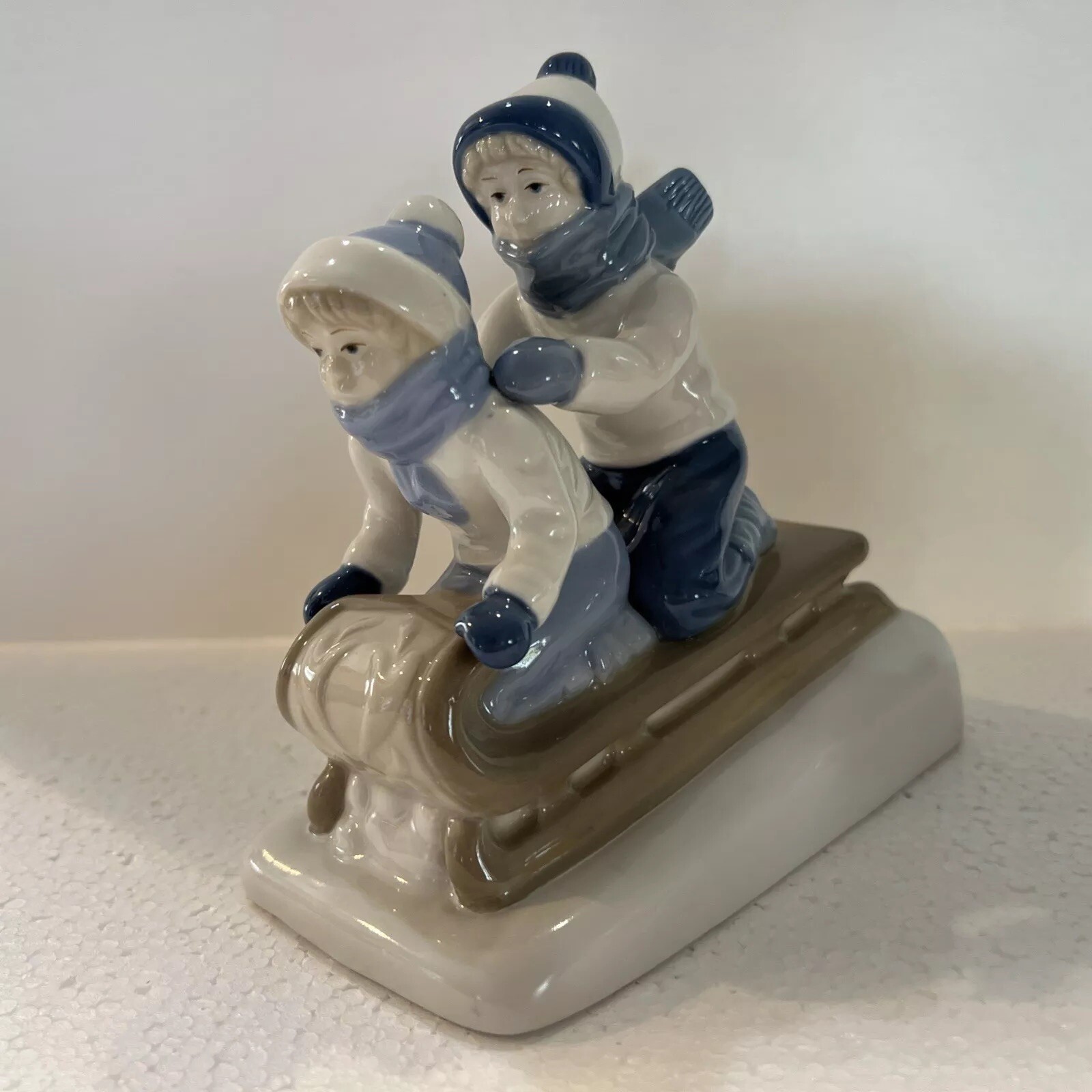 1992 Paul Sebastian Porcelain 2 Children on Toboggan Sled Figurine Mexico
