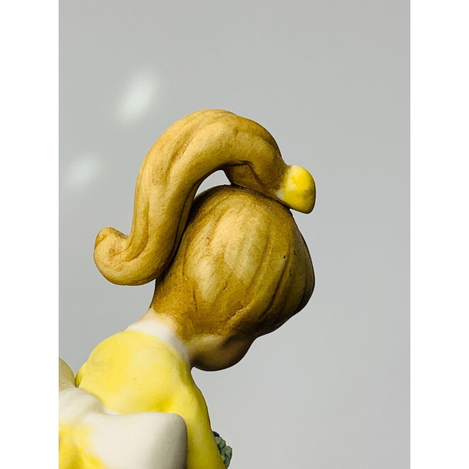 Napco Girl Figurine Yellow Dress and Bow With Blue Flower #8614