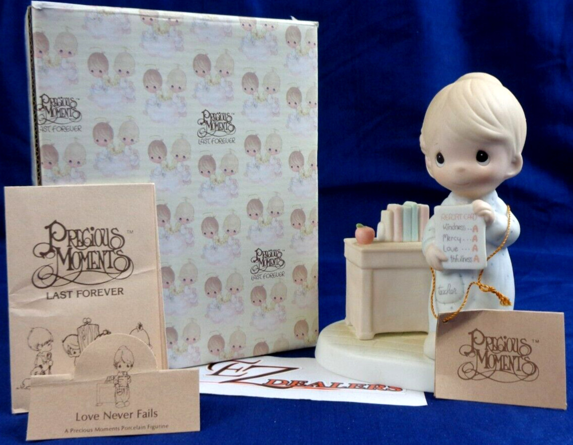 Precious Moments “Love Never Fails” 1984 Figurine- #12300