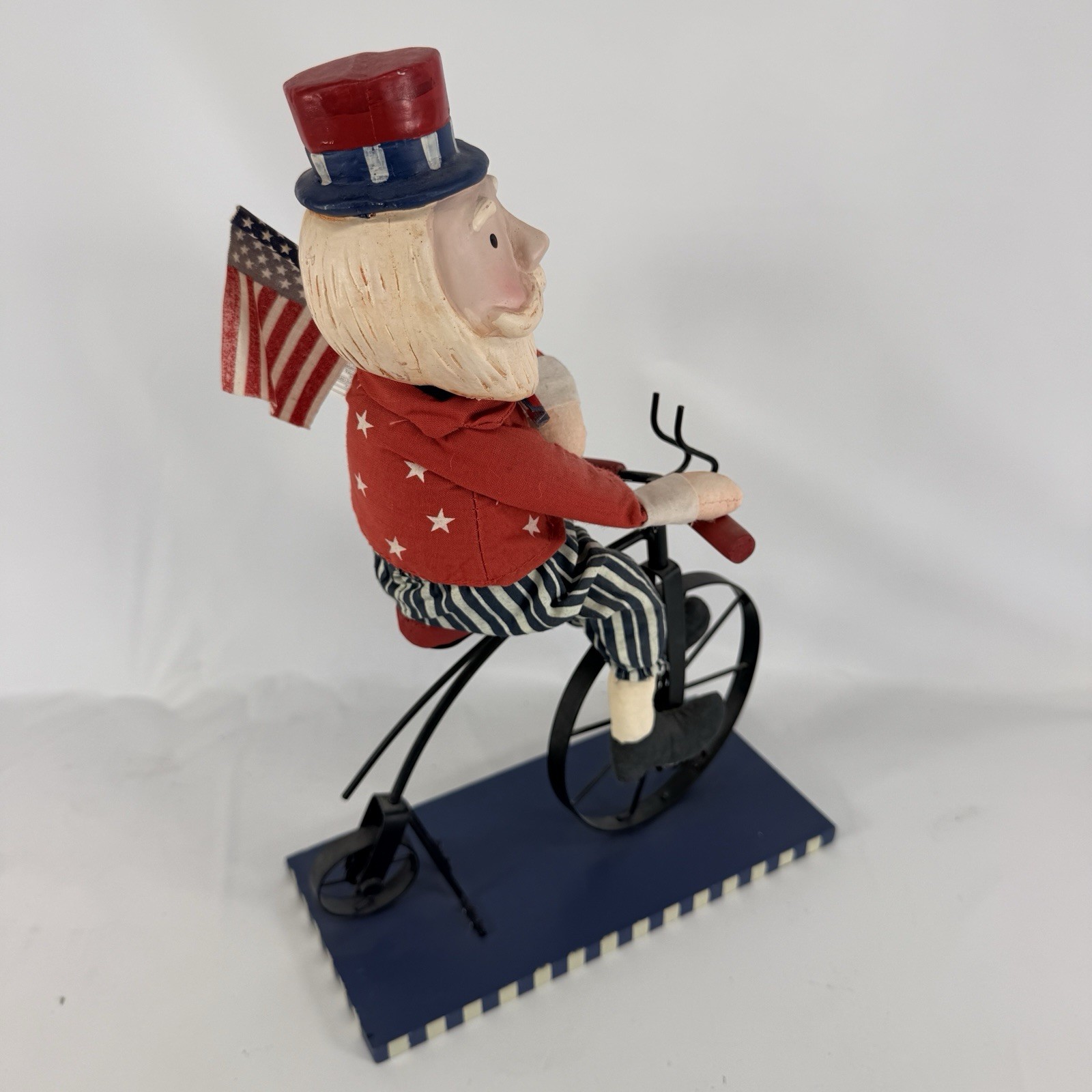 Uncle Sam On A Bicycle Figurine Hand Painted Americana Folk Art Patriotic