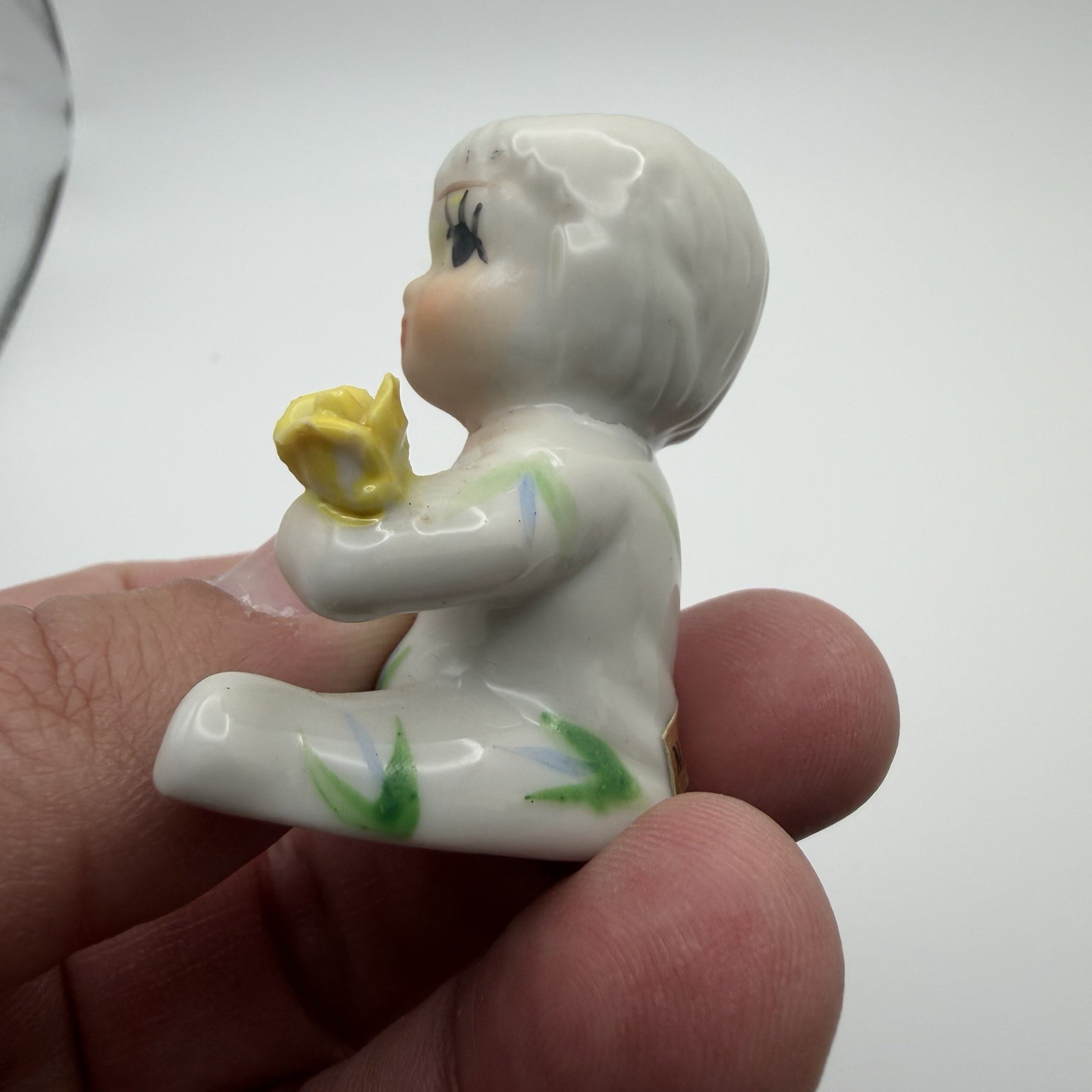 Vintage Napco Style Baby of the Month 2″ Figurine Yellow Flower Taiwan