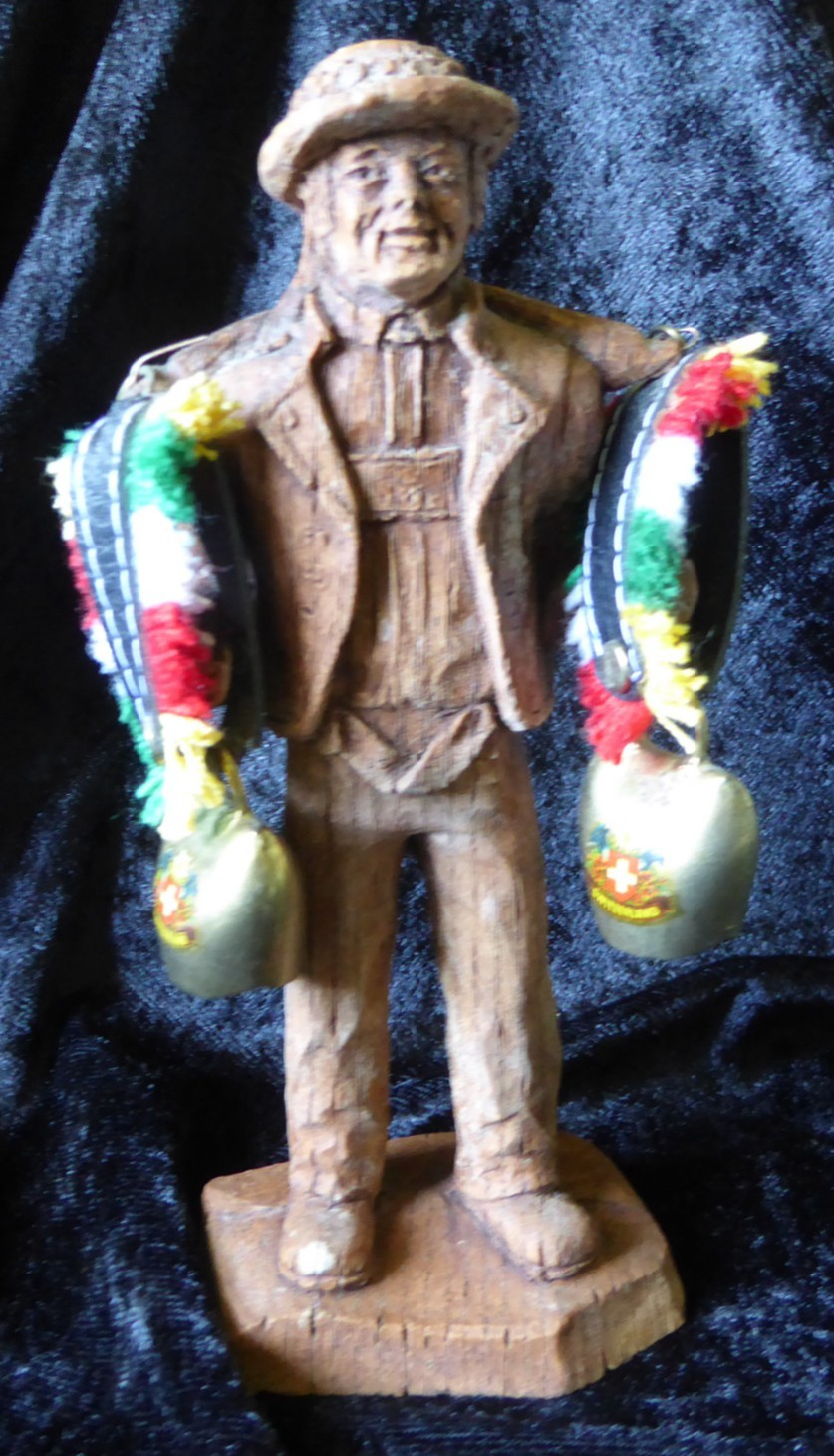 Vintage Hand Carved Wooden Swiss Man Holding Cow Bells Figure 7″ Tall