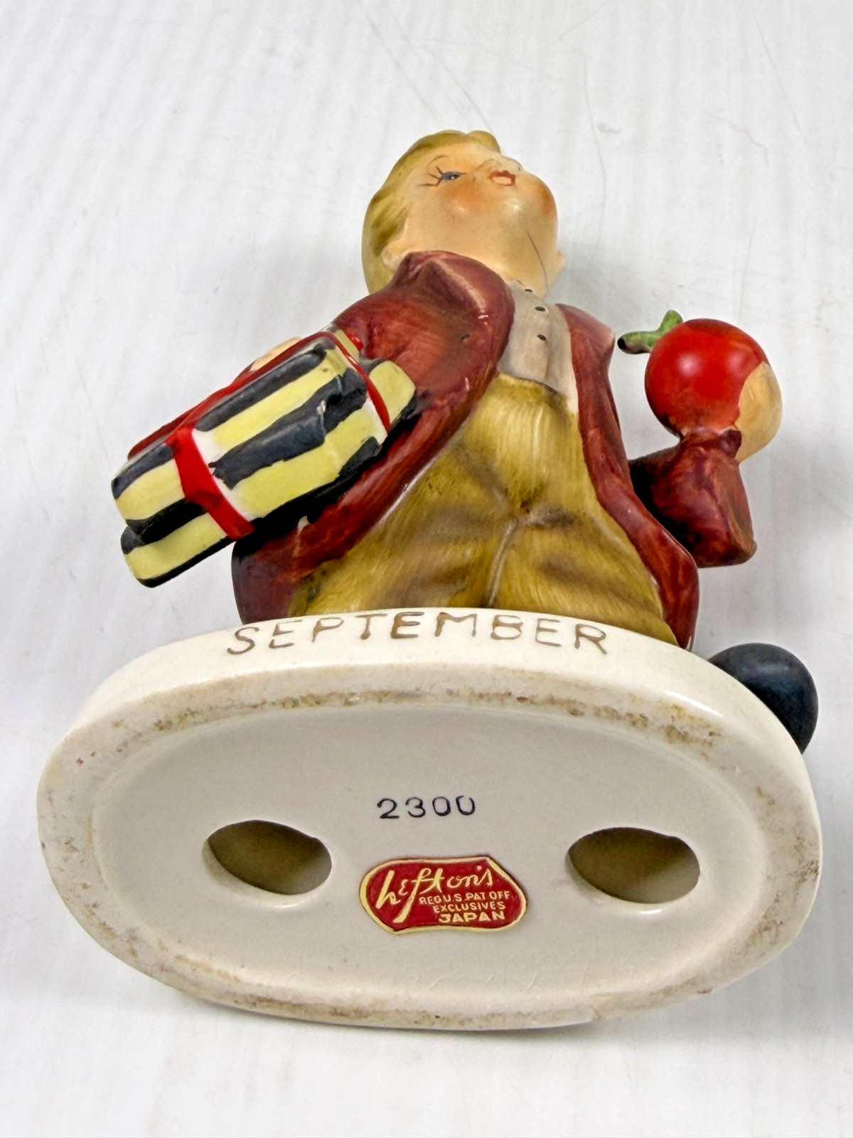 Lefton September Figure 2300 Birthday Boy holding Apple and Books Japan