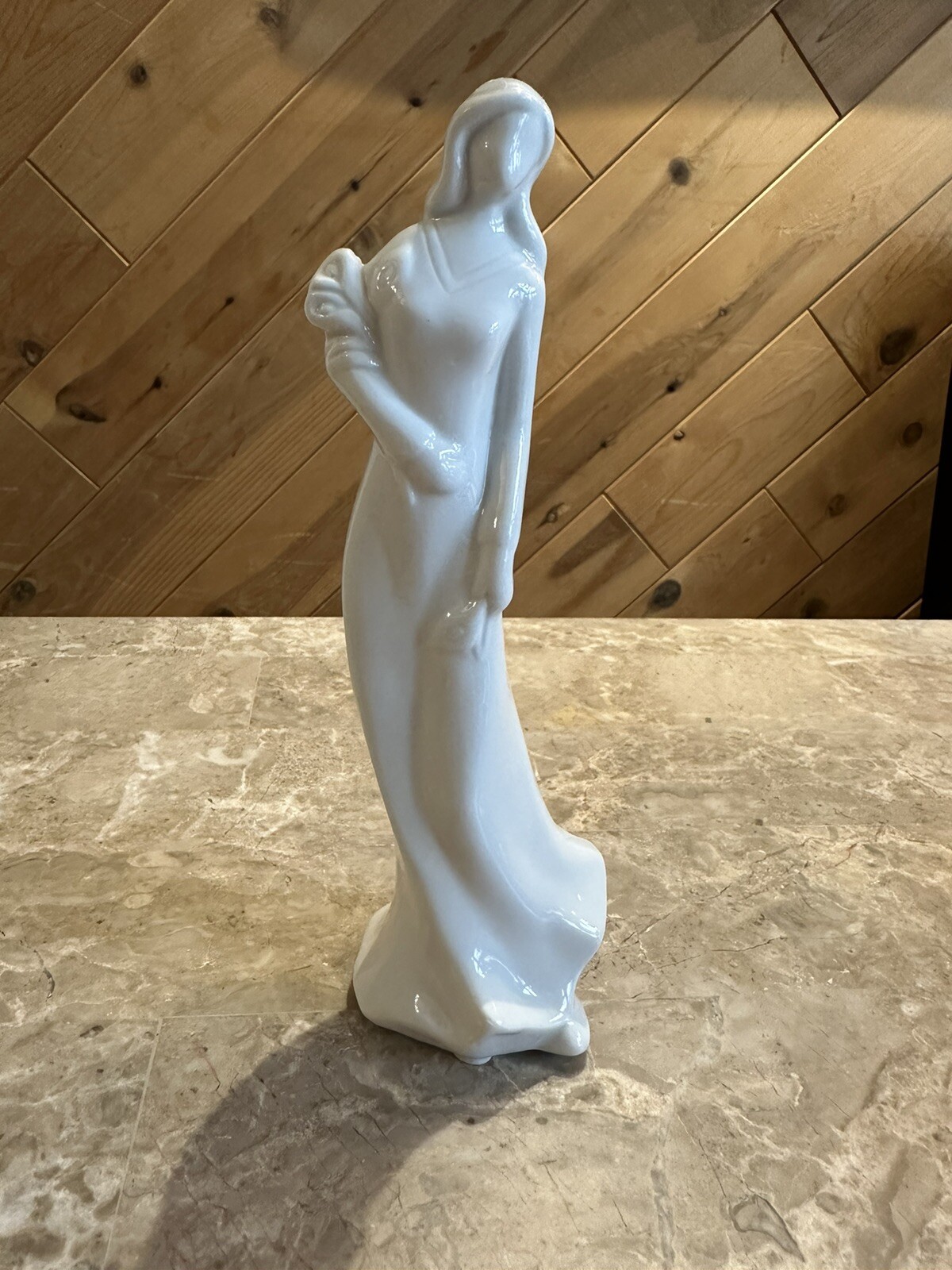 Porcelain Woman Holding Flowers, 8” Tall
