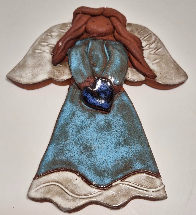 Handmade ceramic angel wall hanging