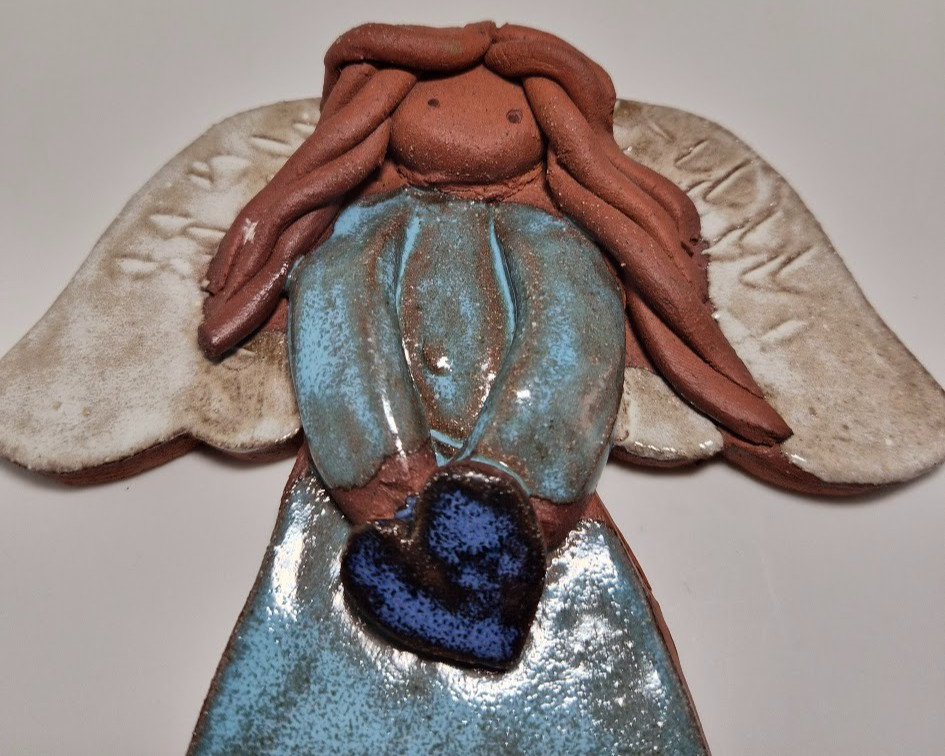 Handmade ceramic angel wall hanging