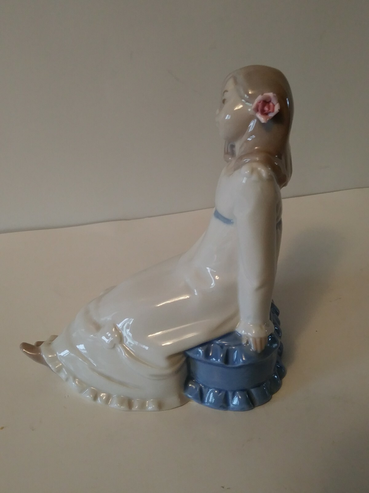 Enrique Nadal Porcelain Girl Sitting on a Cushion Figurine 1987 Excellent shape.