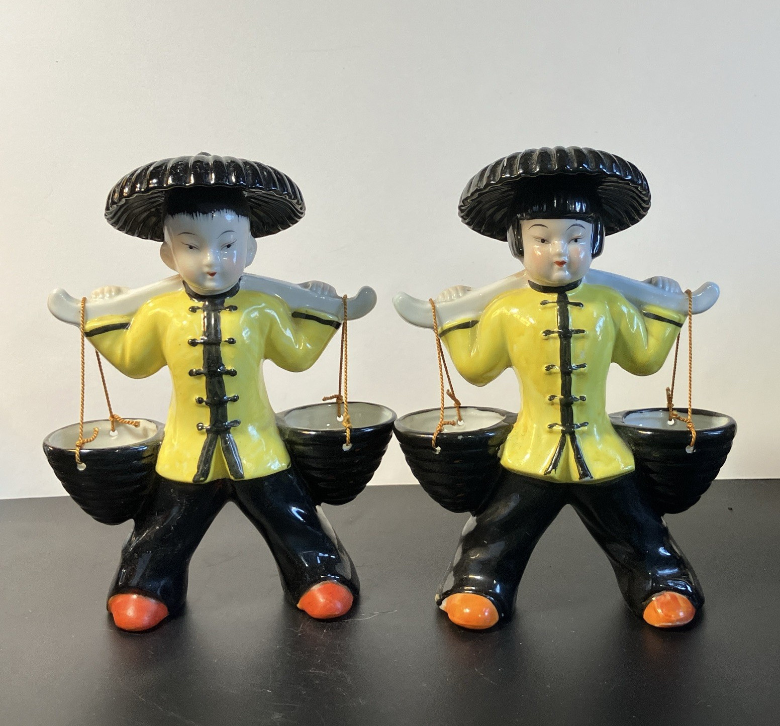 Ceramic girl & boy Figurines Carrying Hanging Bowls Set of 2 Yellow Black Orange