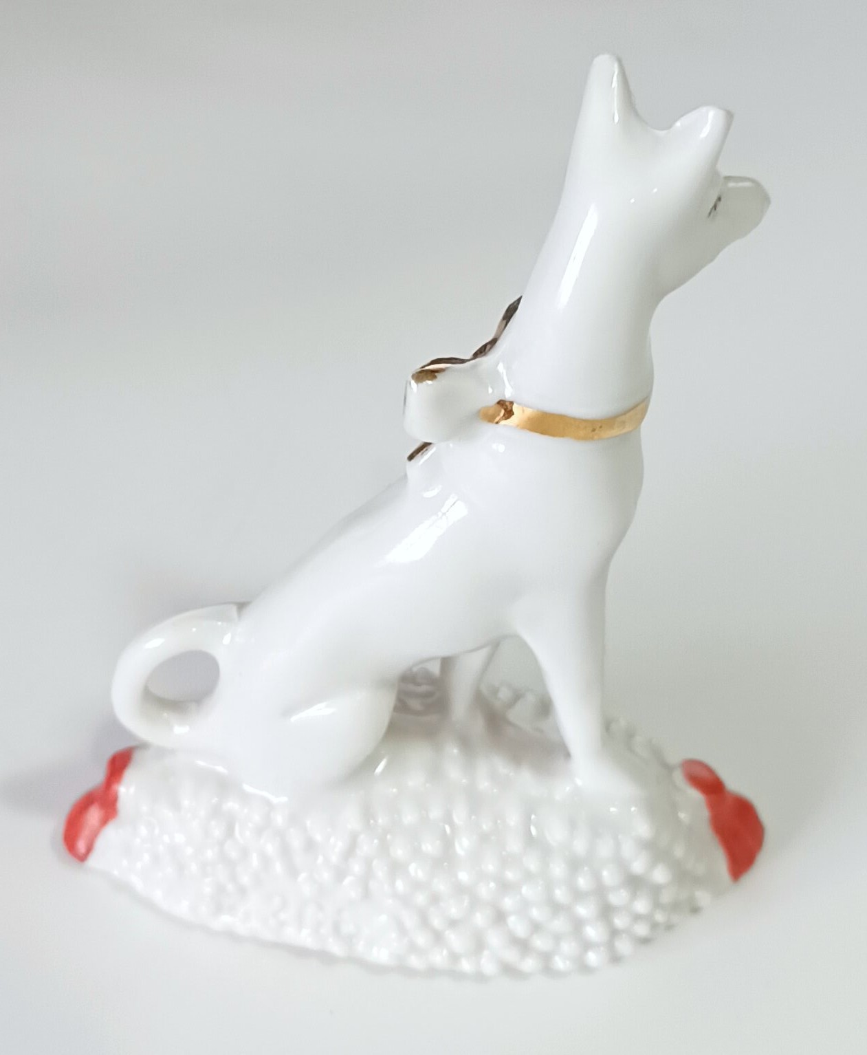 Vintage Germany Porcelain Figurine 2-7/8″: Egyptian Dog w/ Gold Bow