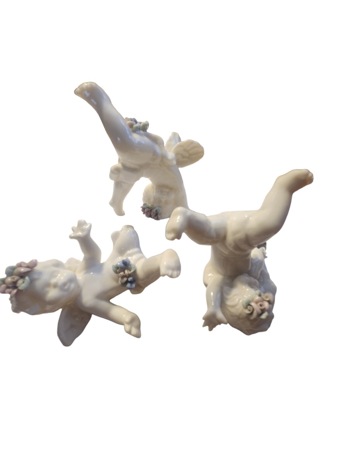 Vintage Ceramic Tumbling Angels Cherubs Figurines with Flowers Set of 3