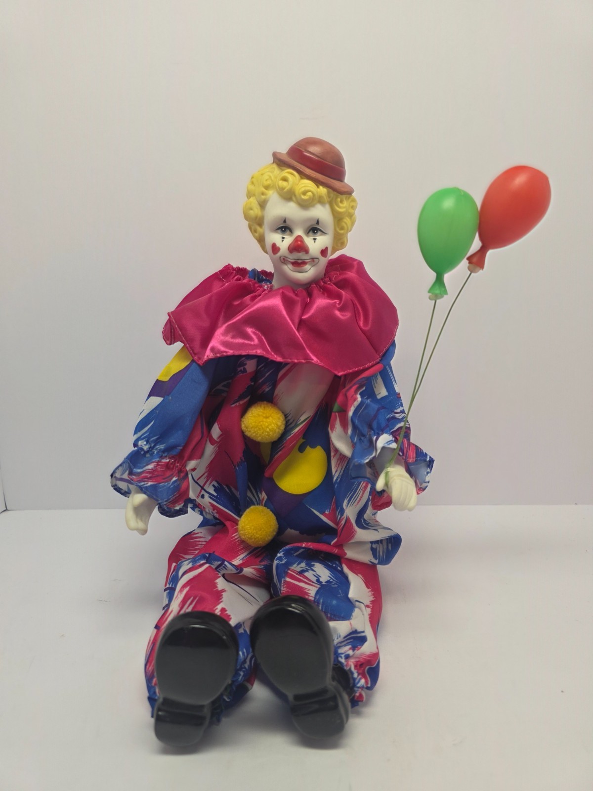 Clown doll with ballons