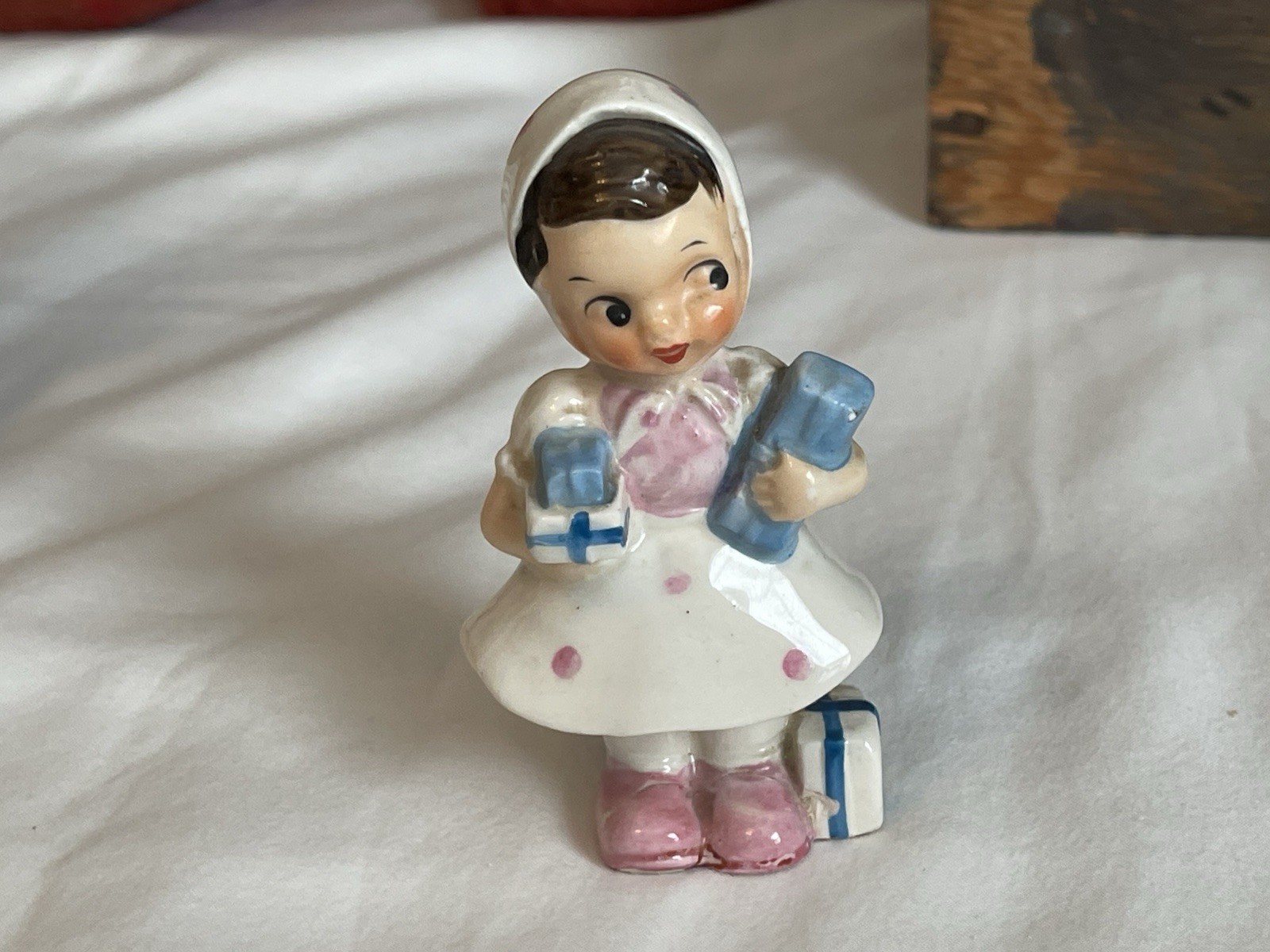 Vintage Ucagco Girl Figurine Carrying Presents 4” Tall Japan
