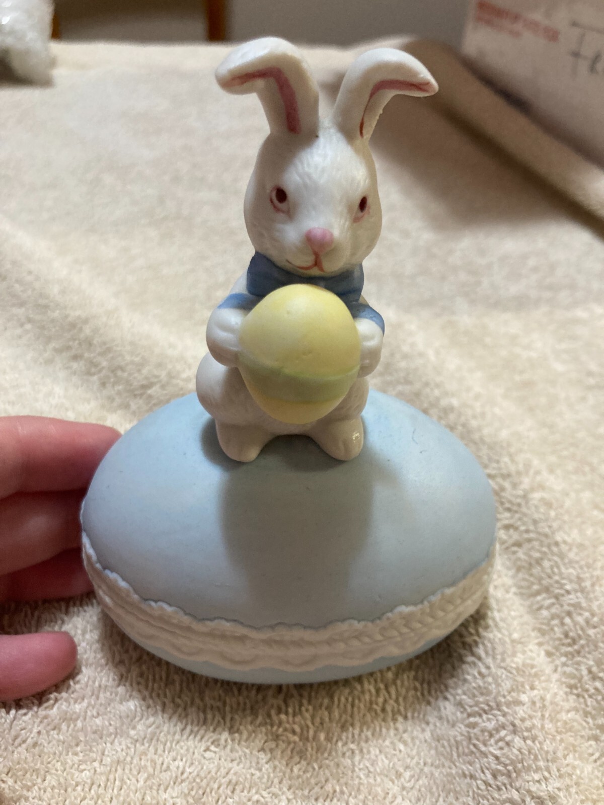 White Rabbit Holding onto Yellow +Green Egg 2 piece Egg that is Blue (Flawed)