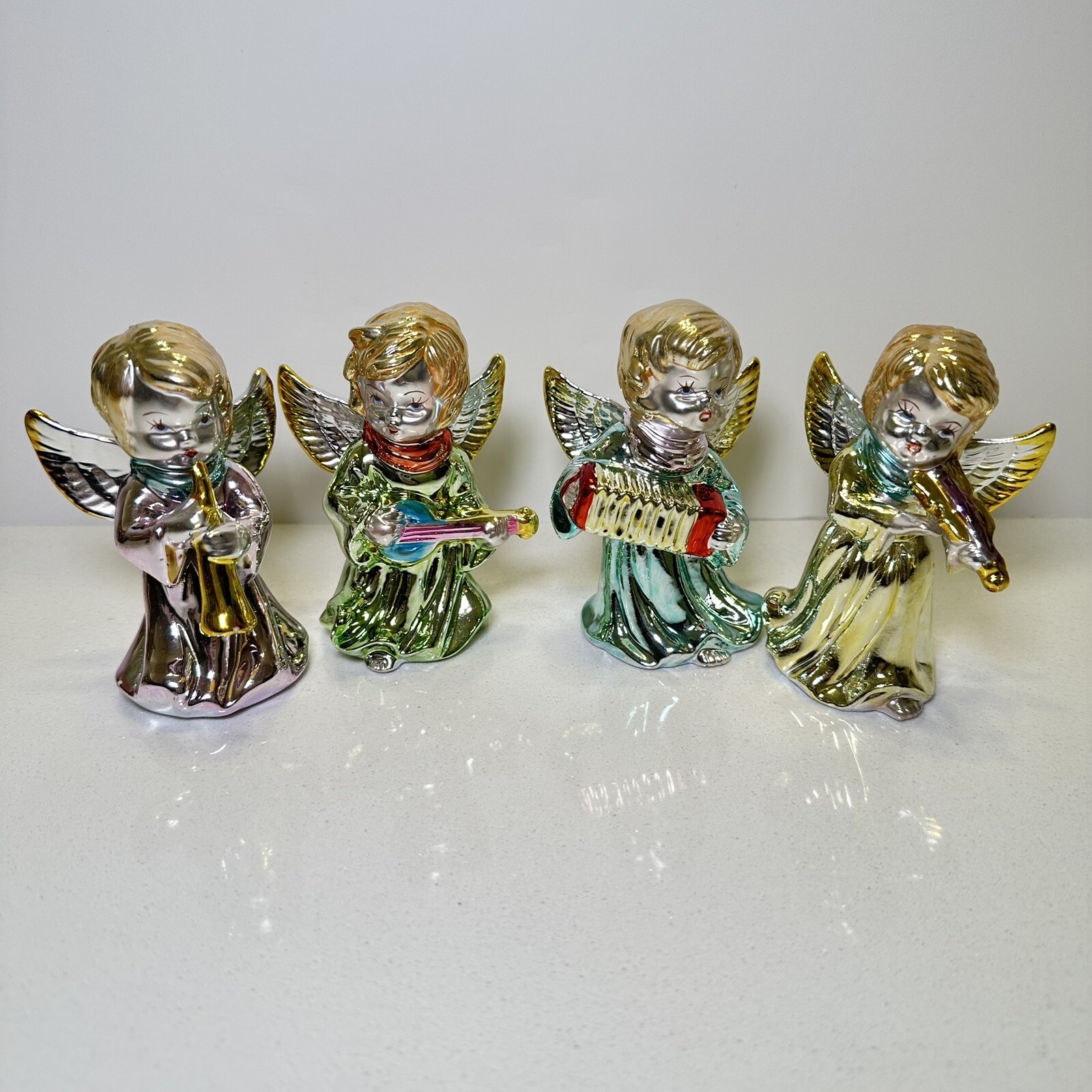 Vintage set of 4 Ceramic Musician Angels w/Gold And Multi Colored Metallic