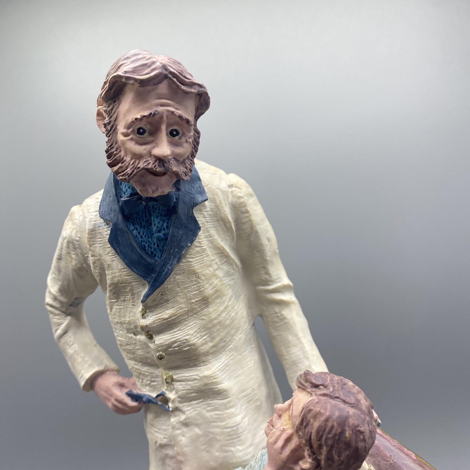 Dentist D.D.S. Pulling Tooth in Chair Resin Figurine on Wood Base READ CONDITION