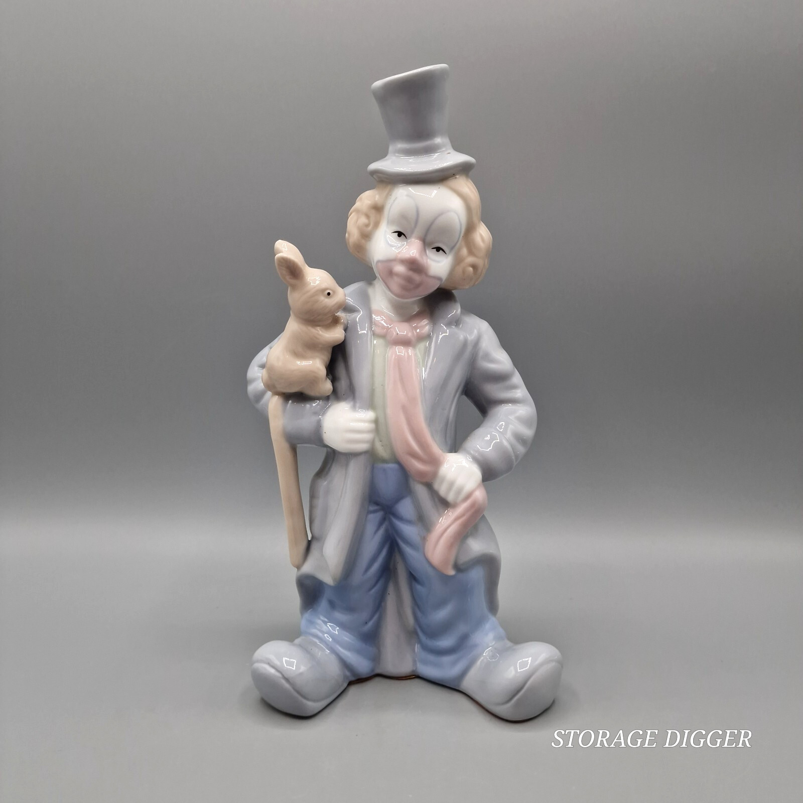 Vintage Blue Gray Brown Porcelain Clown with Rabbit Figurine 9.5″ Tall