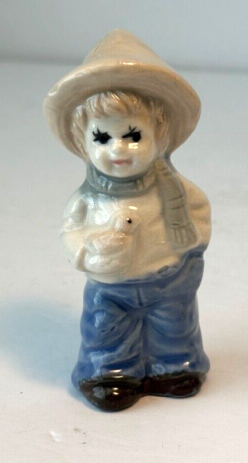 Dutch Farm Boy with Chick Bird Ceramic Figurine 4.5” PORCELAIN BLUE WHITE GLOSSY