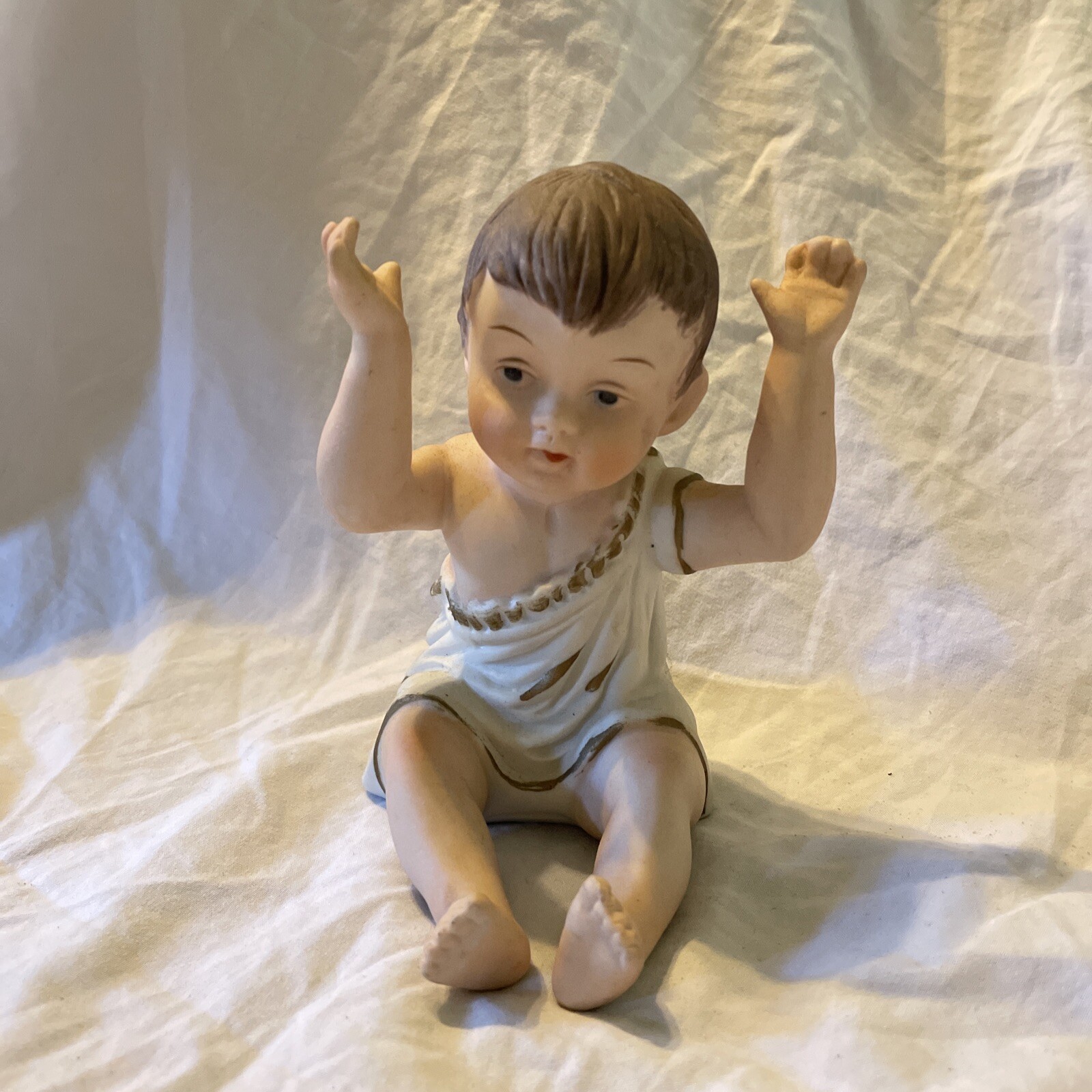 Heubach Unmarked 8” German Piano Baby Toga Greek Sitting Hands Up Figurine Boy