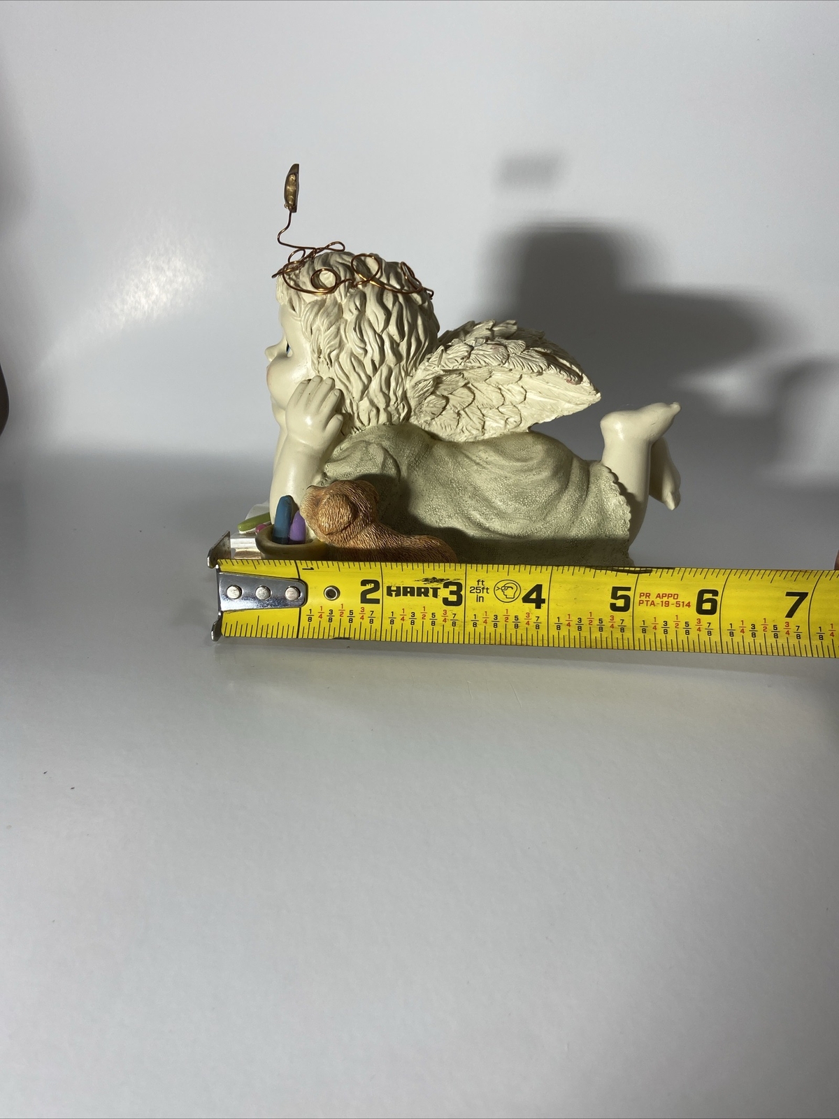 Angel with Puppy Musical Figurine Plays Memory by T.S Eliot